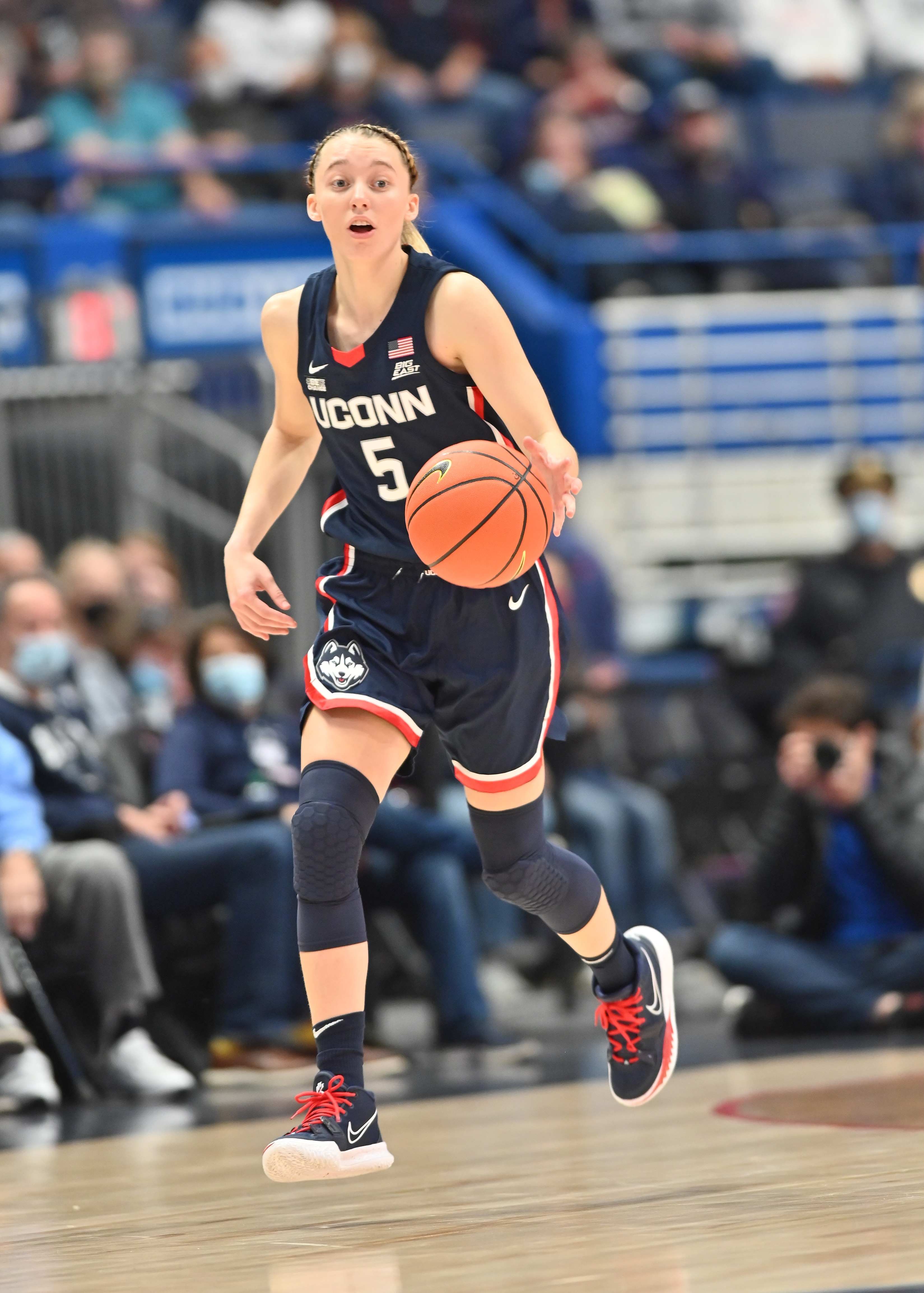 HARTFORD, CT - NOVEMBER 14: UConn Huskies guard Paige Bueckers (5) handles the ball during the game as the Arkansas Razorbacks take on the UConn Huskies during the women's college basketball game on November 14, 2021, at the XL Center in Hartford, Connecticut.(Photo by Williams Paul/Icon Sportswire via Getty Images)