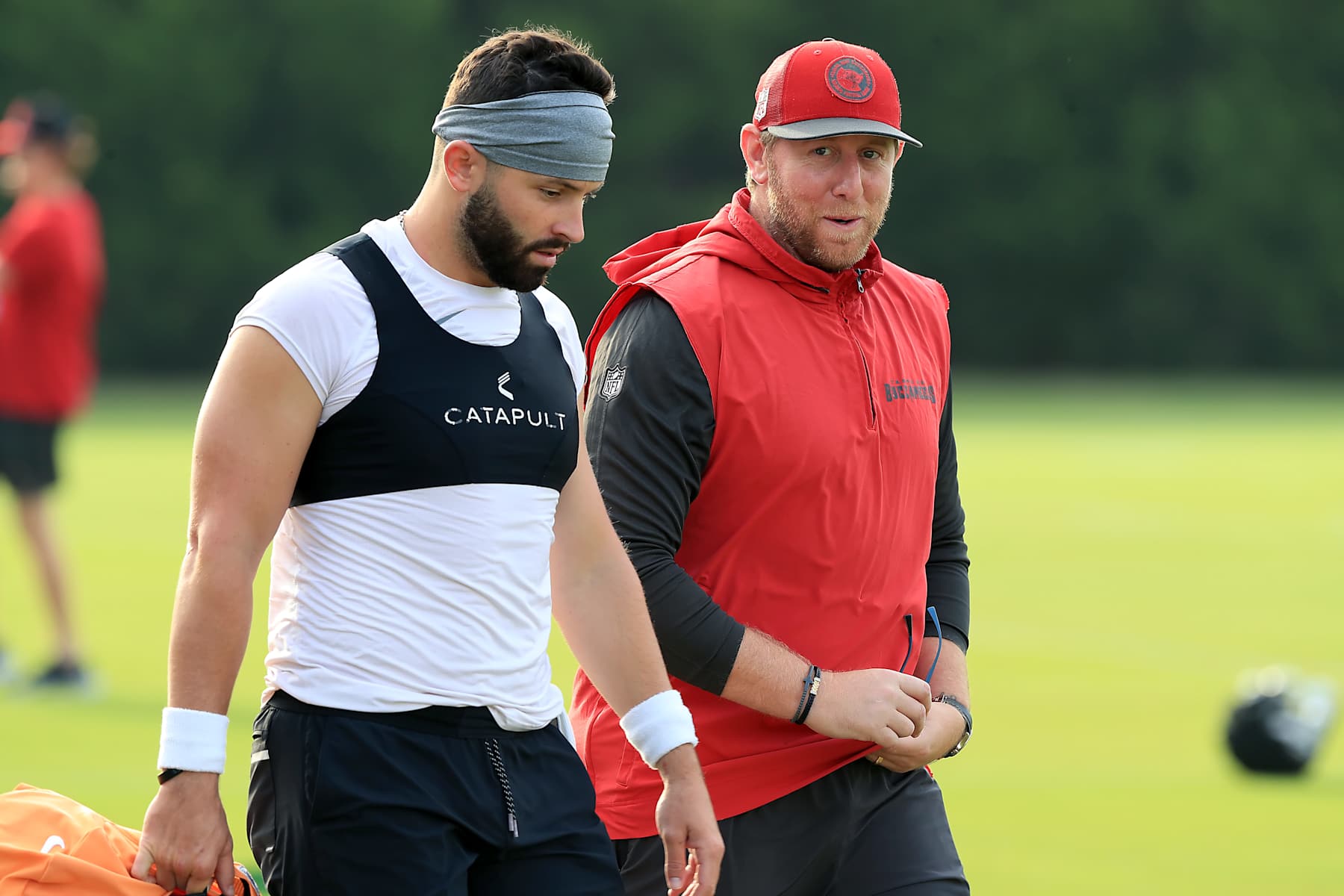 TAMPA, FL - AUG 07: Tampa Bay Buccaneers Quarterback Baker Mayfield (6) walks with Offensive Coordinator Liam Coen during Training Camp on August 07, 2024 at the AdventHealth Training Center at One Buccaneer Place in Tampa, Florida. (Photo by Cliff Welch/Icon Sportswire via Getty Images)