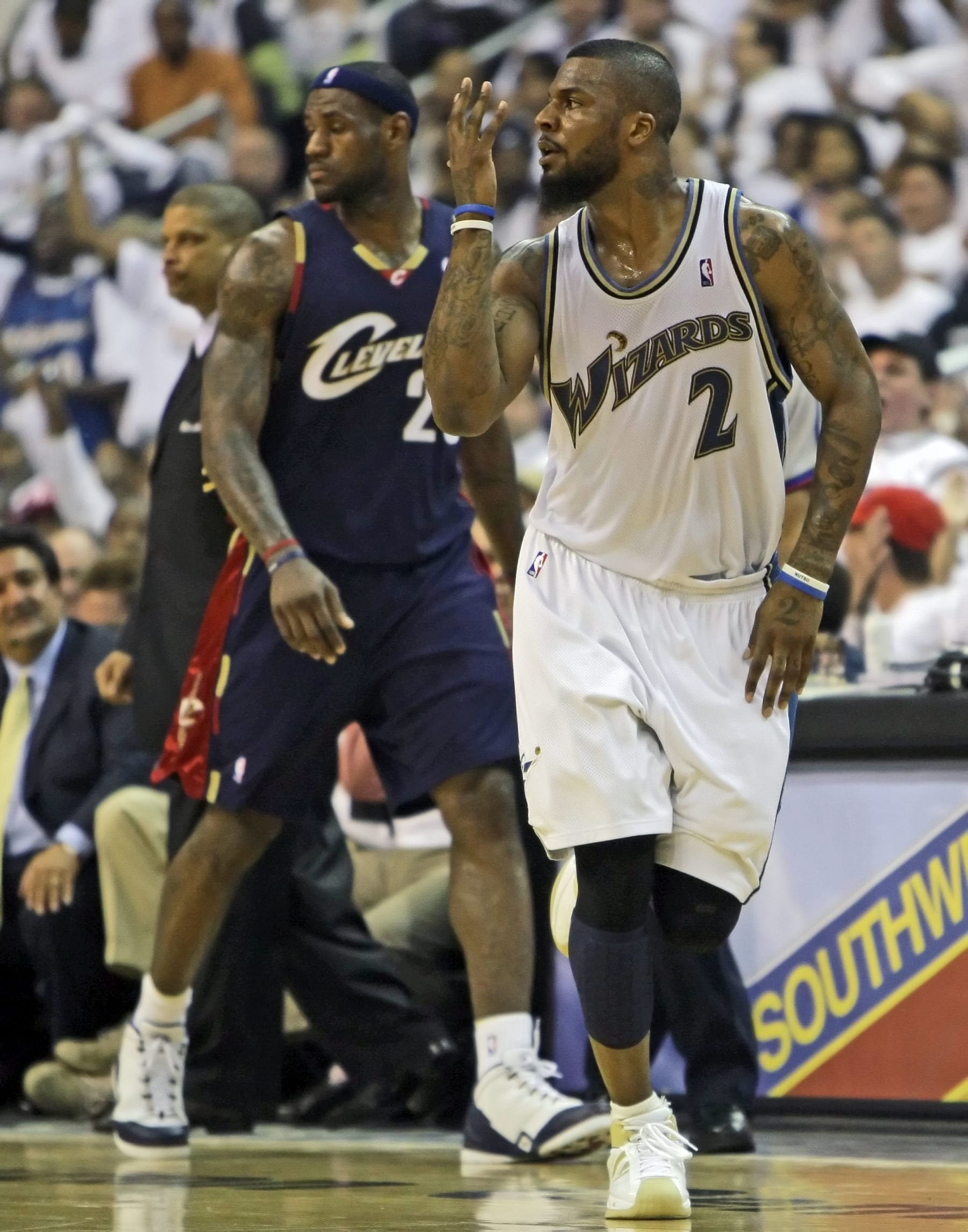 WASHINGTON - APRIL 24: DeShawn Stevenson #2 of the Washington Wizards celebrates a play in front of LeBron James #23 of the Cleveland Cavaliers in Game Three of the Eastern Conference Quarterfinals during the 2008 NBA Playoffs at the Verizon Center on April 24, 2008 in Washington, DC. The Wizards won 108-72. NOTE TO USER: User expressly acknowledges and agrees that, by downloading and or using this photograph, User is consenting to the terms and conditions of the Getty Images License Agreement. (Photo by Drew Hallowell/Getty Images)