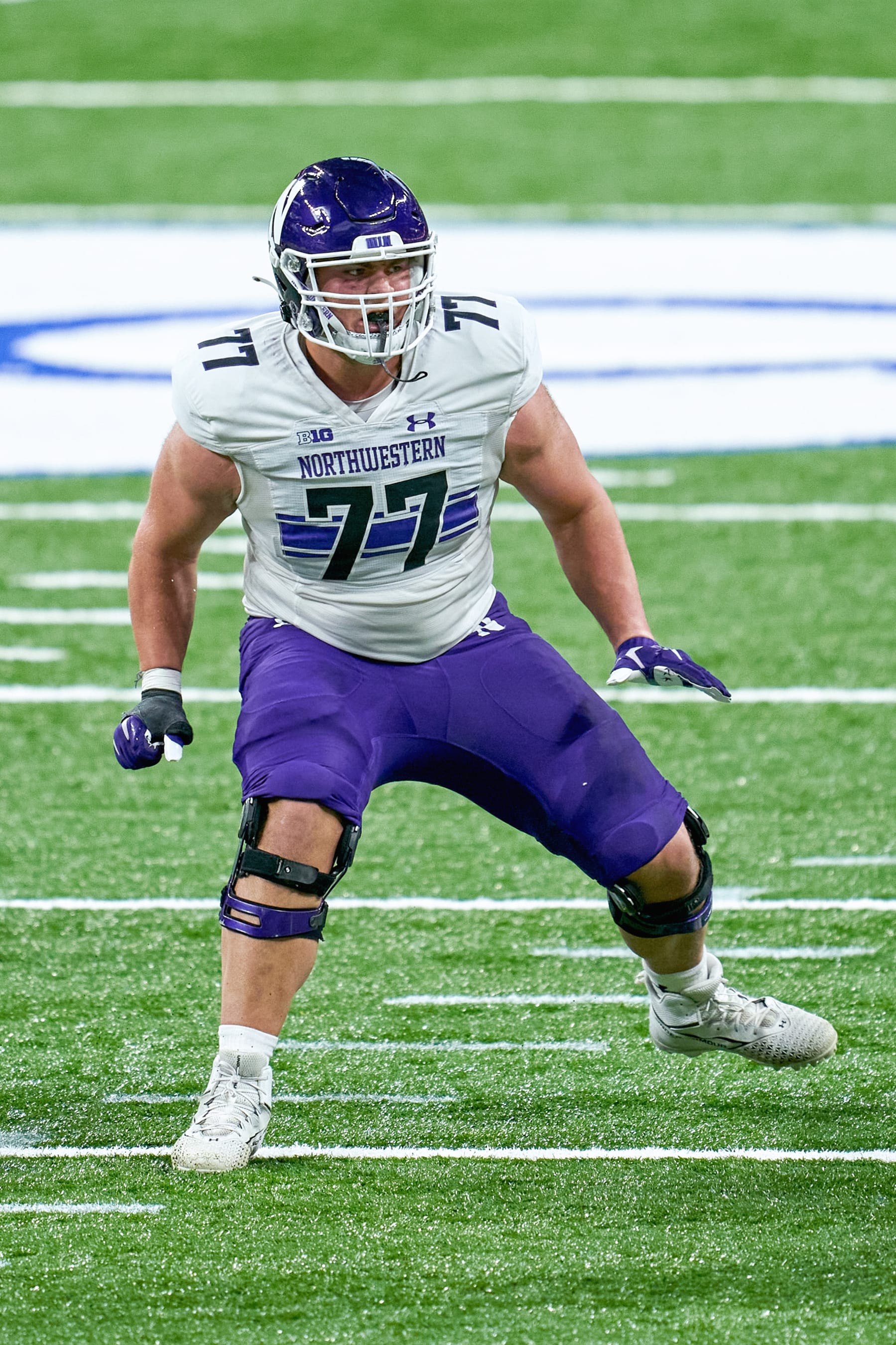 INDIANAPOLIS, IN - DECEMBER 19: Northwestern Wildcats offensive lineman Peter Skoronski (77) in action during the Big Ten Championship game between the Ohio State Buckeyes and the Northwestern Wildcats on December 19, 2020 at Lucas Oil stadium, in Indianapolis, IN. (Photo by Robin Alam/Icon Sportswire via Getty Images)