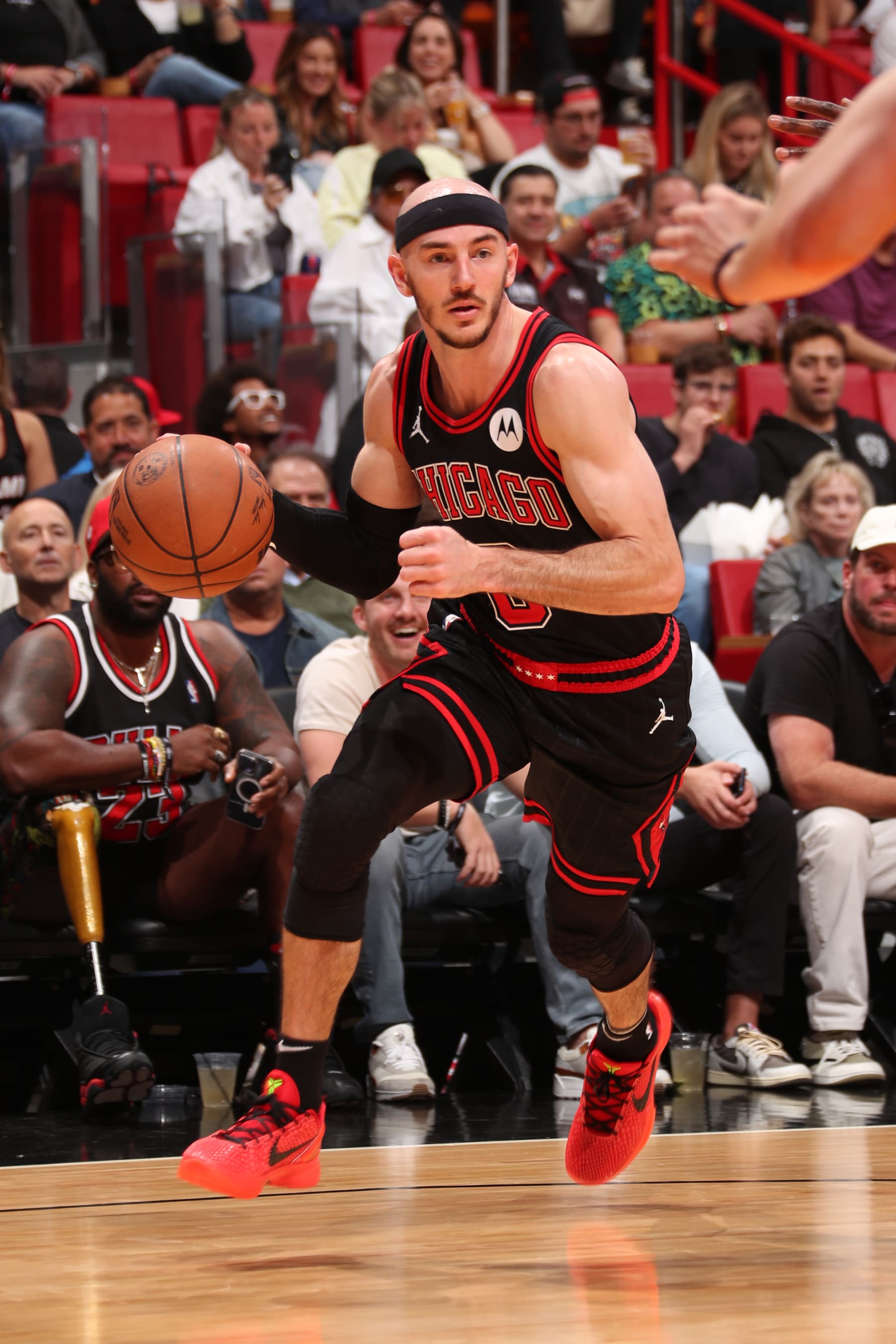 MIAMI, FL - APRIL 19: Alex Caruso #6 of the Chicago Bulls dribbles the ball during the game against the Miami Heat during the 2024 Play-In Tournament on April 19, 2024 at Kaseya Center in Miami, Florida. NOTE TO USER: User expressly acknowledges and agrees that, by downloading and or using this Photograph, user is consenting to the terms and conditions of the Getty Images License Agreement. Mandatory Copyright Notice: Copyright 2024 NBAE (Photo by Issac Baldizon/NBAE via Getty Images)