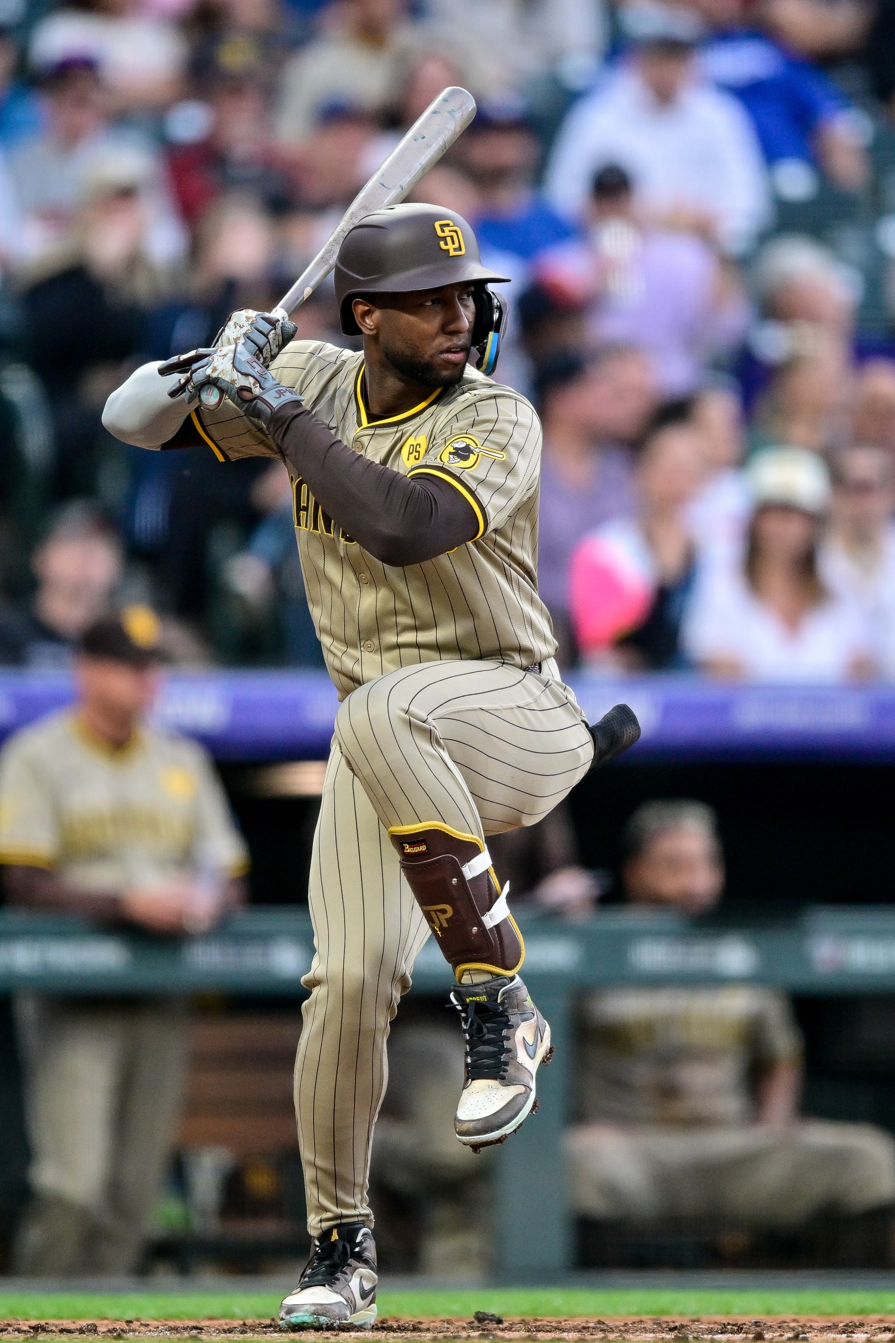 DENVER, COLORADO - APRIL 22: Jurickson Profar #10 of the San Diego Padres bats in the third inning against the Colorado Rockies at Coors Field on April 22, 2024 in Denver, Colorado. (Photo by Dustin Bradford/Getty Images)