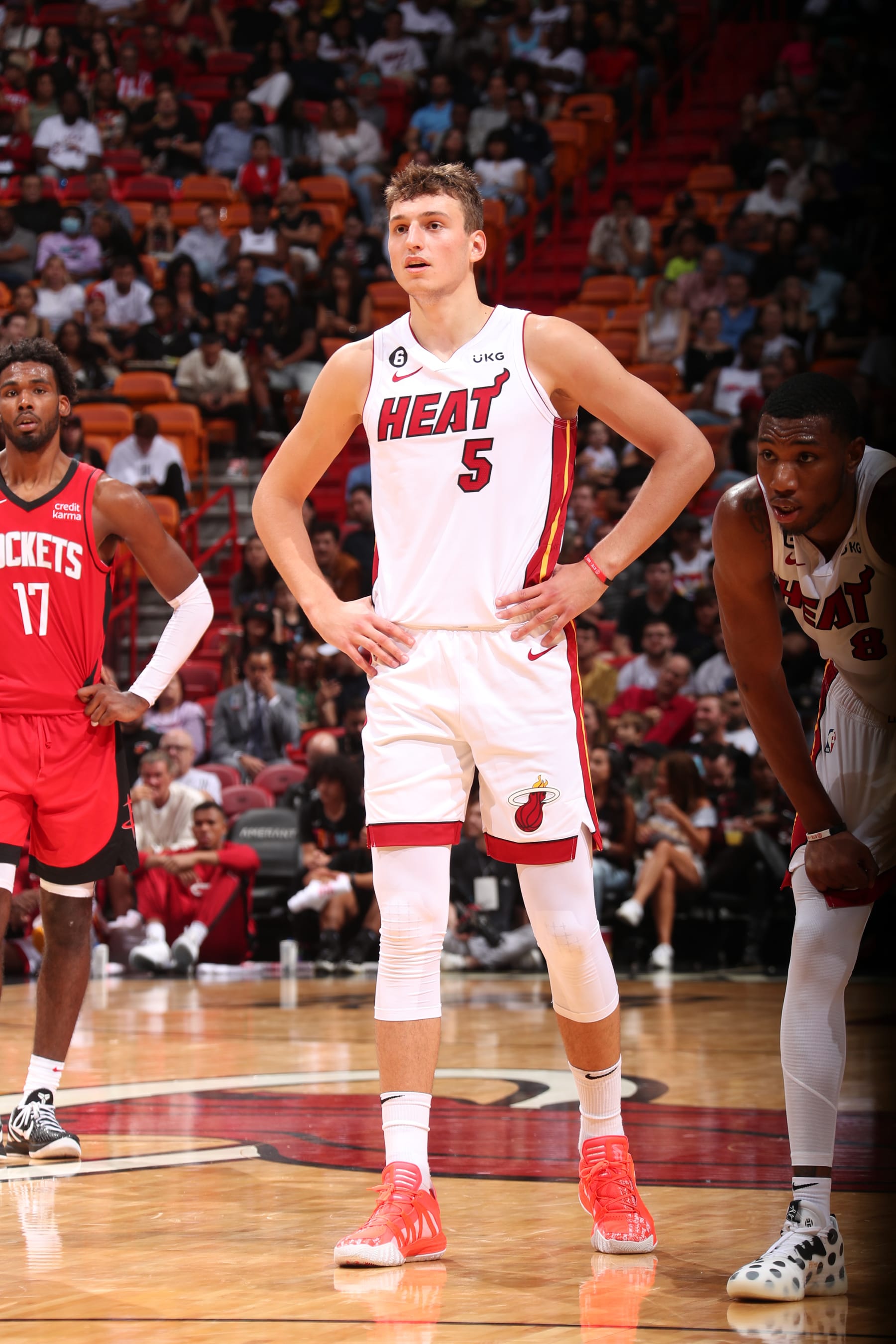 MIAMI, FL - OCTOBER 10: Nikola Jovic #5 of the Miami Heat looks on during the game against the Houston Rockets on October 10, 2022 at FTX Arena in Miami, Florida. NOTE TO USER: User expressly acknowledges and agrees that, by downloading and or using this Photograph, user is consenting to the terms and conditions of the Getty Images License Agreement. Mandatory Copyright Notice: Copyright 2022 NBAE (Photo by Oscar Baldizon/NBAE via Getty Images)