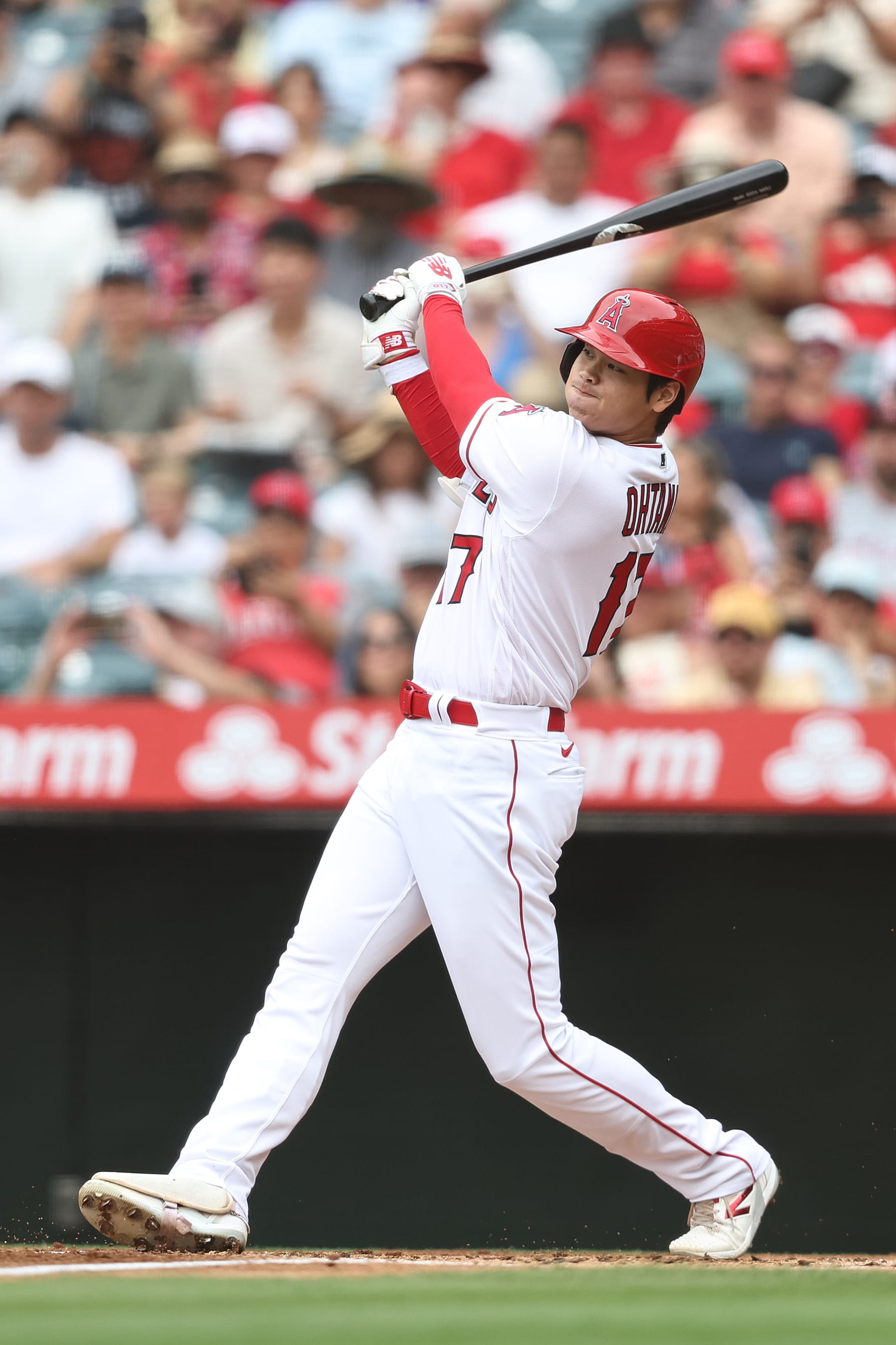 ANAHEIM, CALIFORNIA - JULY 23: Shohei Ohtani #17 of the Los Angeles Angels hits a solo home run in the first inning against the Pittsburgh Pirates at Angel Stadium of Anaheim on July 23, 2023 in Anaheim, California. (Photo by Michael Owens/Getty Images)