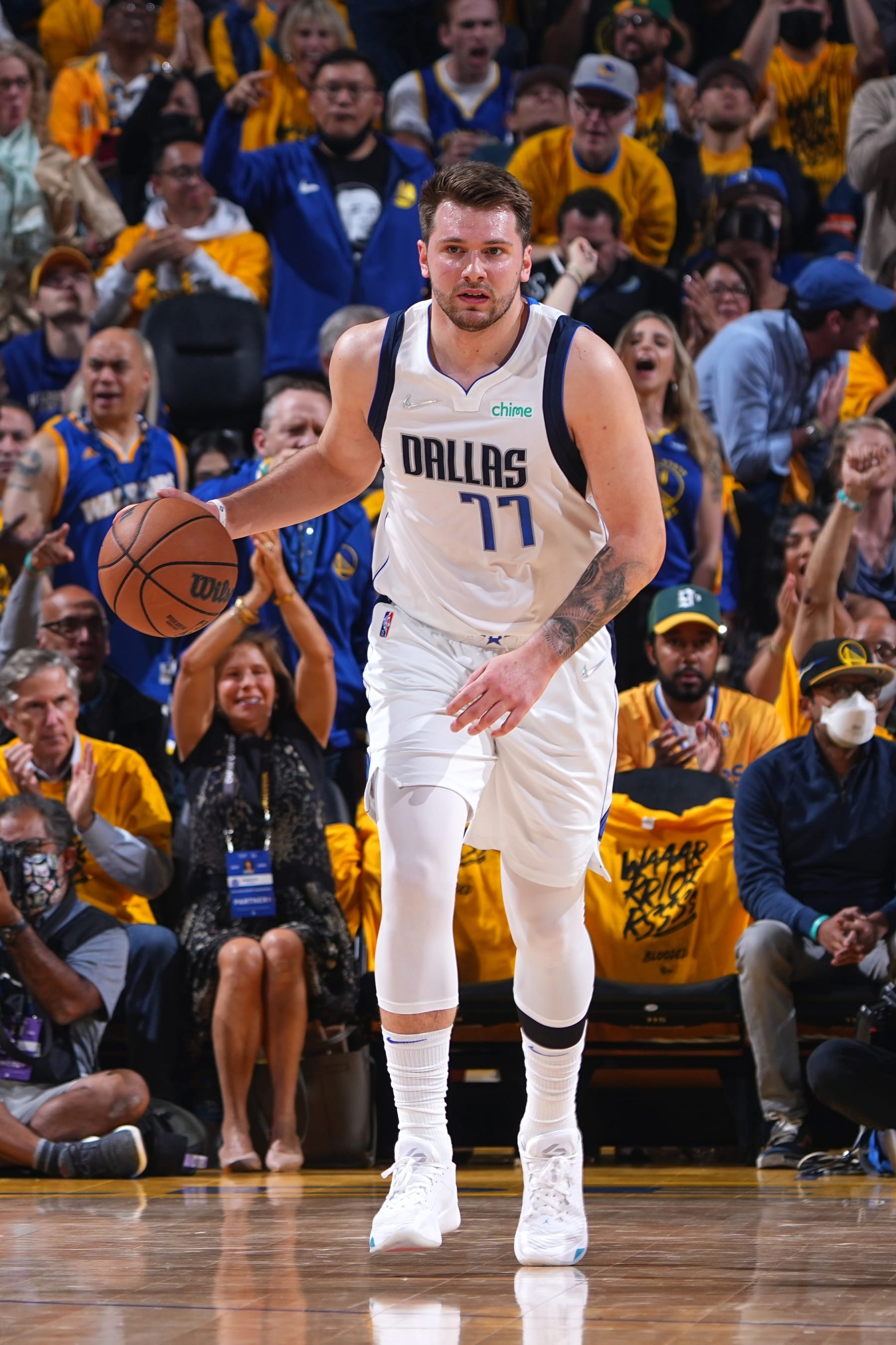SAN FRANCISCO, CA - MAY 26: Luka Doncic #77 of the Dallas Mavericks dribbles the ball against the Golden State Warriors during Game 5 of the 2022 NBA Playoffs Western Conference Finals on May 26, 2022 at Chase Center in San Francisco, California. NOTE TO USER: User expressly acknowledges and agrees that, by downloading and or using this photograph, user is consenting to the terms and conditions of Getty Images License Agreement. Mandatory Copyright Notice: Copyright 2022 NBAE (Photo by Garrett Ellwood/NBAE via Getty Images)