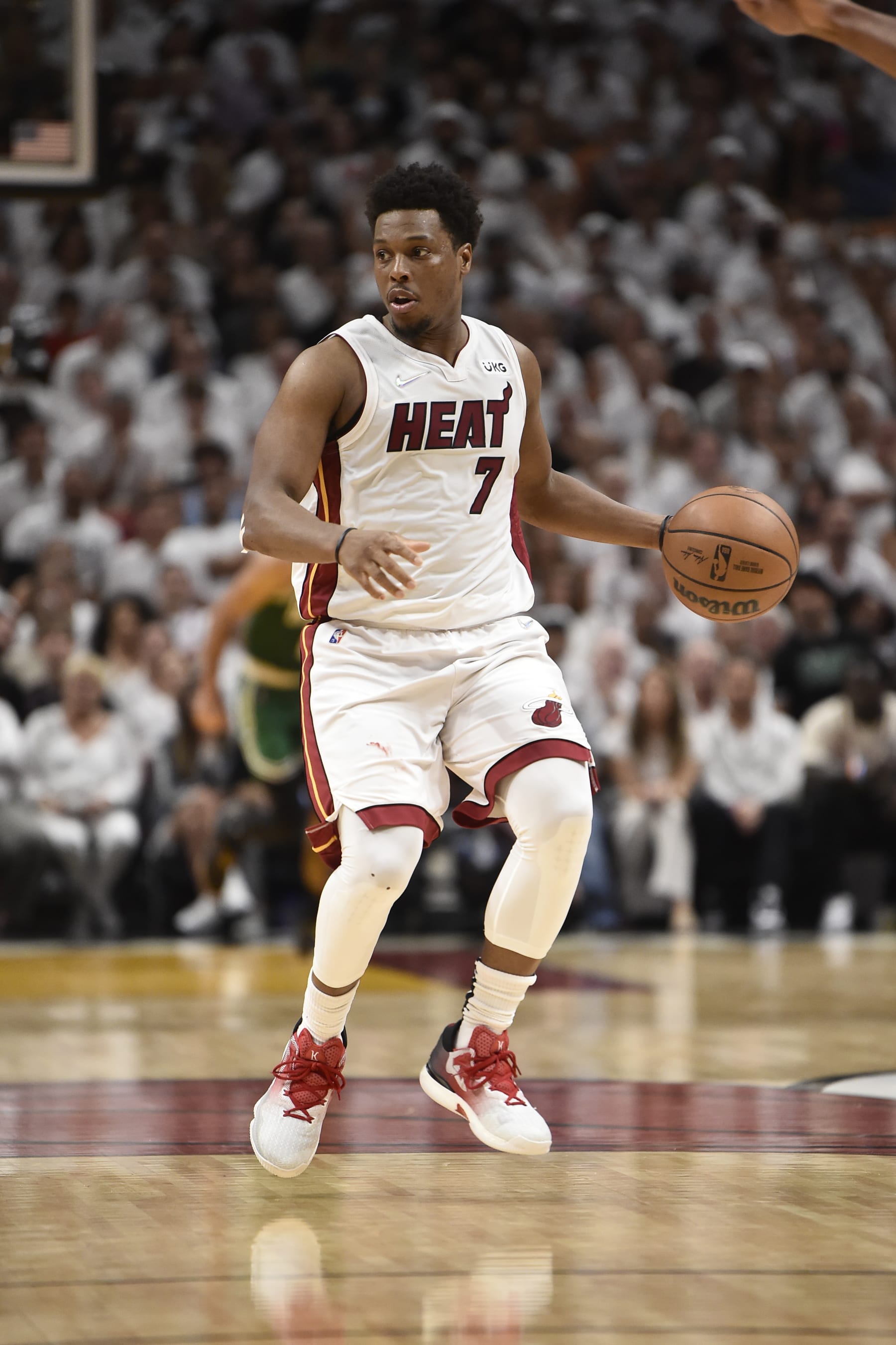 MIAMI, FL - MAY 29: Kyle Lowry #7 of the Miami Heat dribbles the ball during Game 7 of the 2022 NBA Playoffs Eastern Conference Finals on May 29, 2022 at FTX Arena in Miami, Florida. NOTE TO USER: User expressly acknowledges and agrees that, by downloading and or using this Photograph, user is consenting to the terms and conditions of the Getty Images License Agreement. Mandatory Copyright Notice: Copyright 2022 NBAE (Photo by David Dow/NBAE via Getty Images)