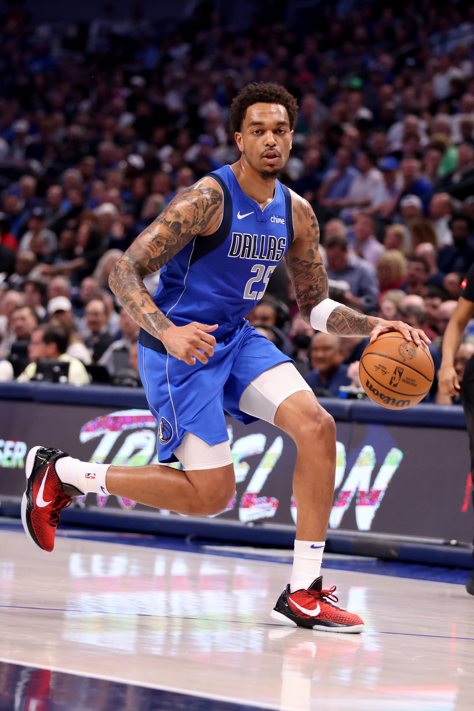 DALLAS, TEXAS - MARCH 05: P.J. Washington #25 of the Dallas Mavericks dribbles the ball against the Indiana Pacers in the first half at American Airlines Center on March 05, 2024 in Dallas, Texas. NOTE TO USER: User expressly acknowledges and agrees that, by downloading and or using this photograph, User is consenting to the terms and conditions of the Getty Images License Agreement. (Photo by Tim Heitman/Getty Images)