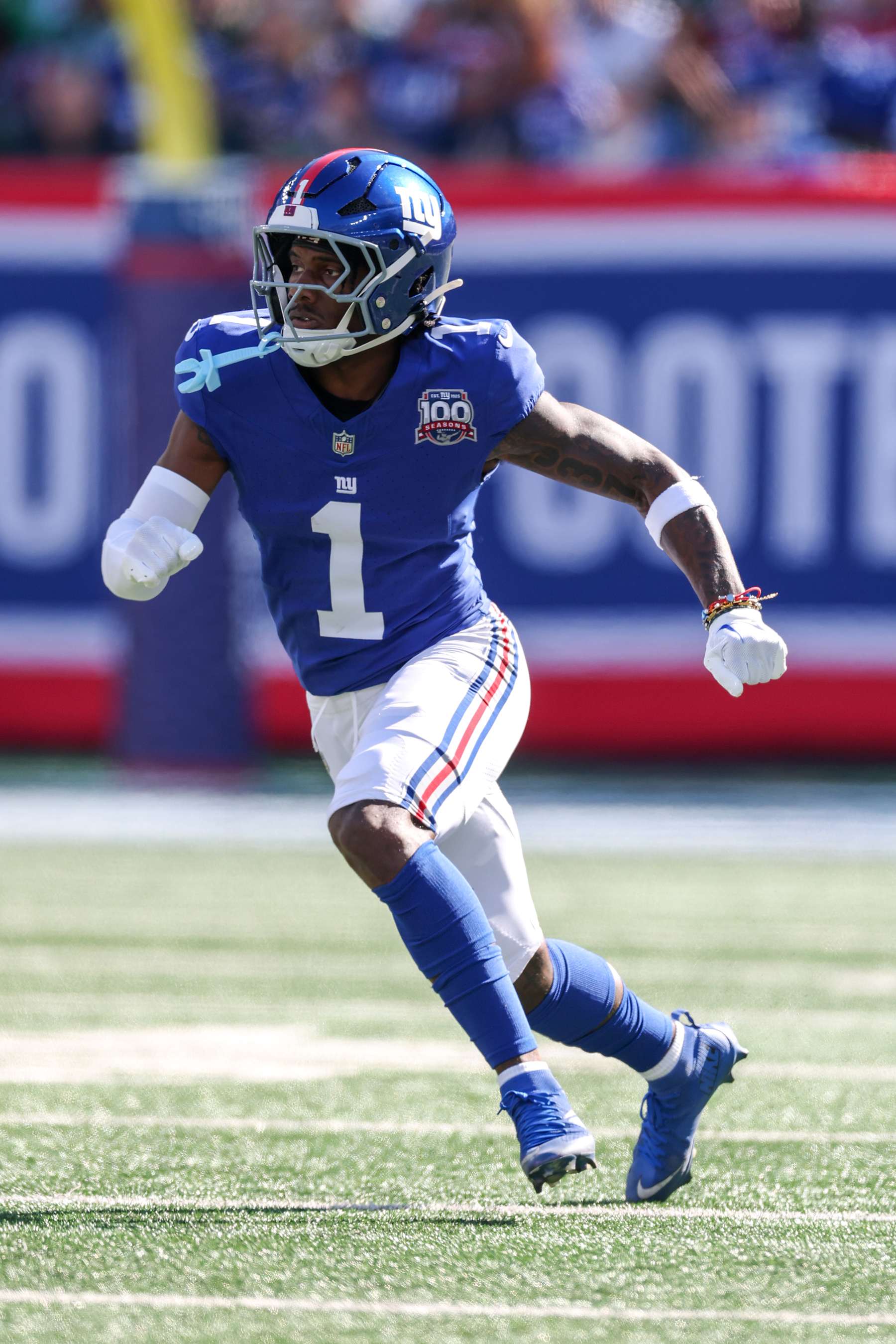 EAST RUTHERFORD, NEW JERSEY - OCTOBER 20: Malik Nabers #1 of the New York Giants runs against the Philadelphia Eagles during the game at MetLife Stadium on October 20, 2024 in East Rutherford, New Jersey. (Photo by Al Bello/Getty Images)
