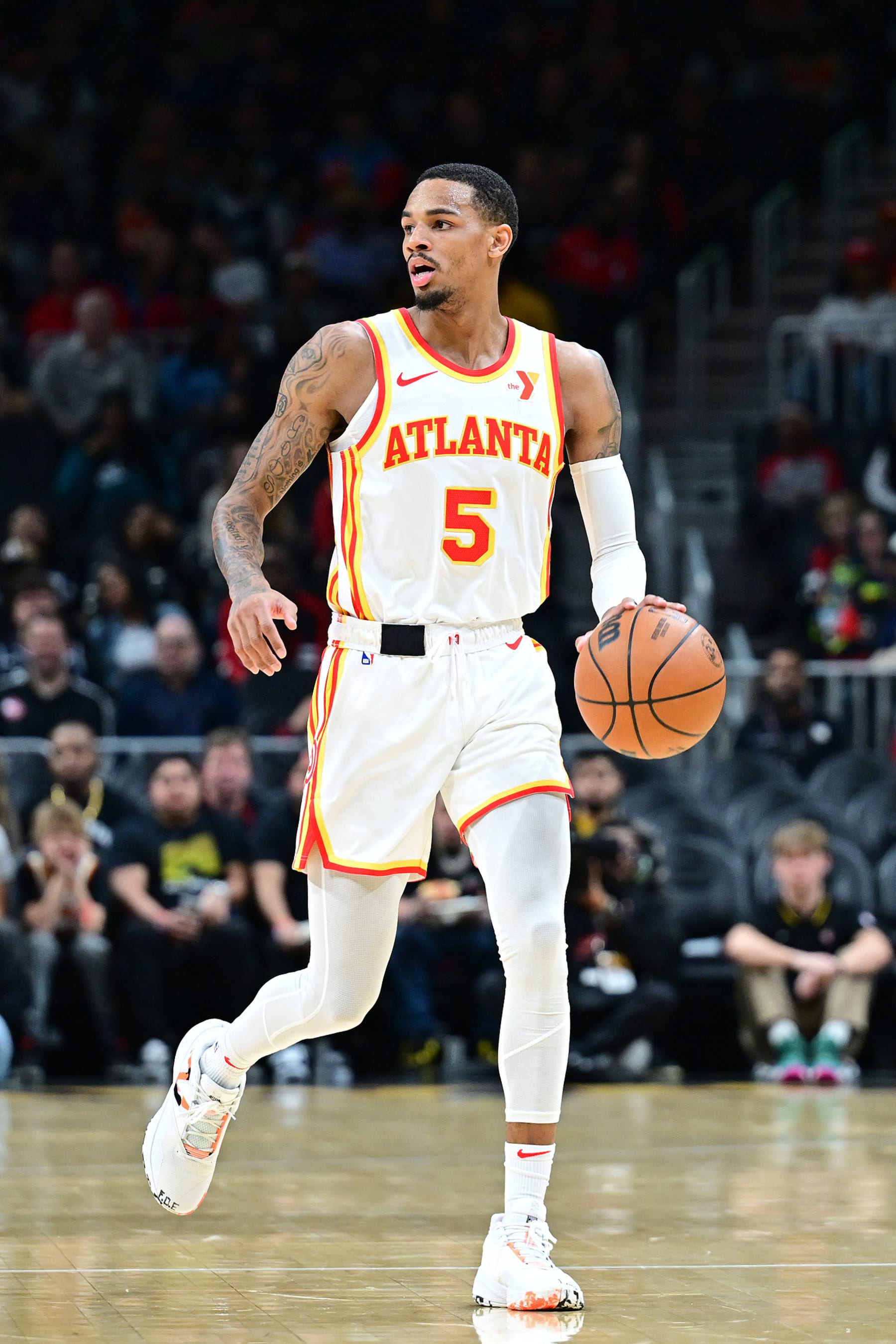 ATLANTA, GA - JANUARY 26: Dejounte Murray #5 of the Atlanta Hawks brings the ball up court during the game against the Dallas Mavericks on January 26, 2024 at State Farm Arena in Atlanta, Georgia.  NOTE TO USER: User expressly acknowledges and agrees that, by downloading and/or using this Photograph, user is consenting to the terms and conditions of the Getty Images License Agreement. Mandatory Copyright Notice: Copyright 2024 NBAE (Photo by Adam Hagy/NBAE via Getty Images)