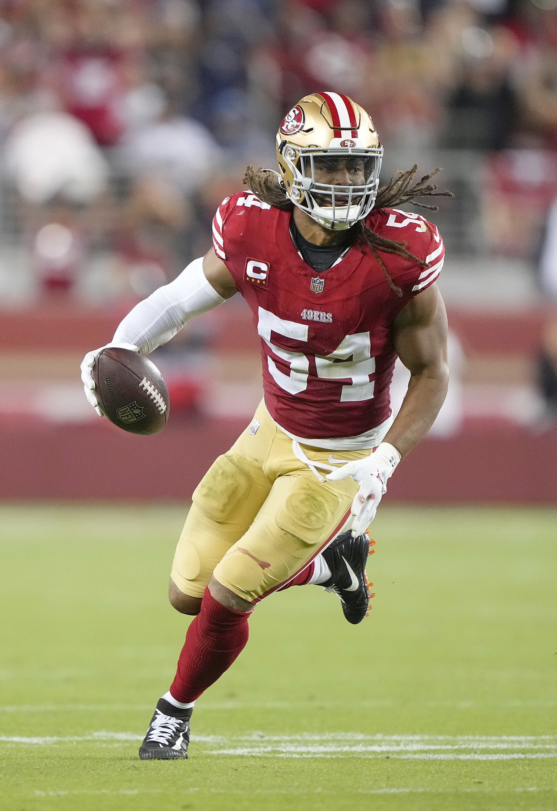 SANTA CLARA, CALIFORNIA - OCTOBER 08: Fred Warner #54 of the San Francisco 49ers returns an interception against the Dallas Cowboys during the fourth quarter of an NFL football game at Levi's Stadium on October 08, 2023 in Santa Clara, California. (Photo by Thearon W. Henderson/Getty Images)
