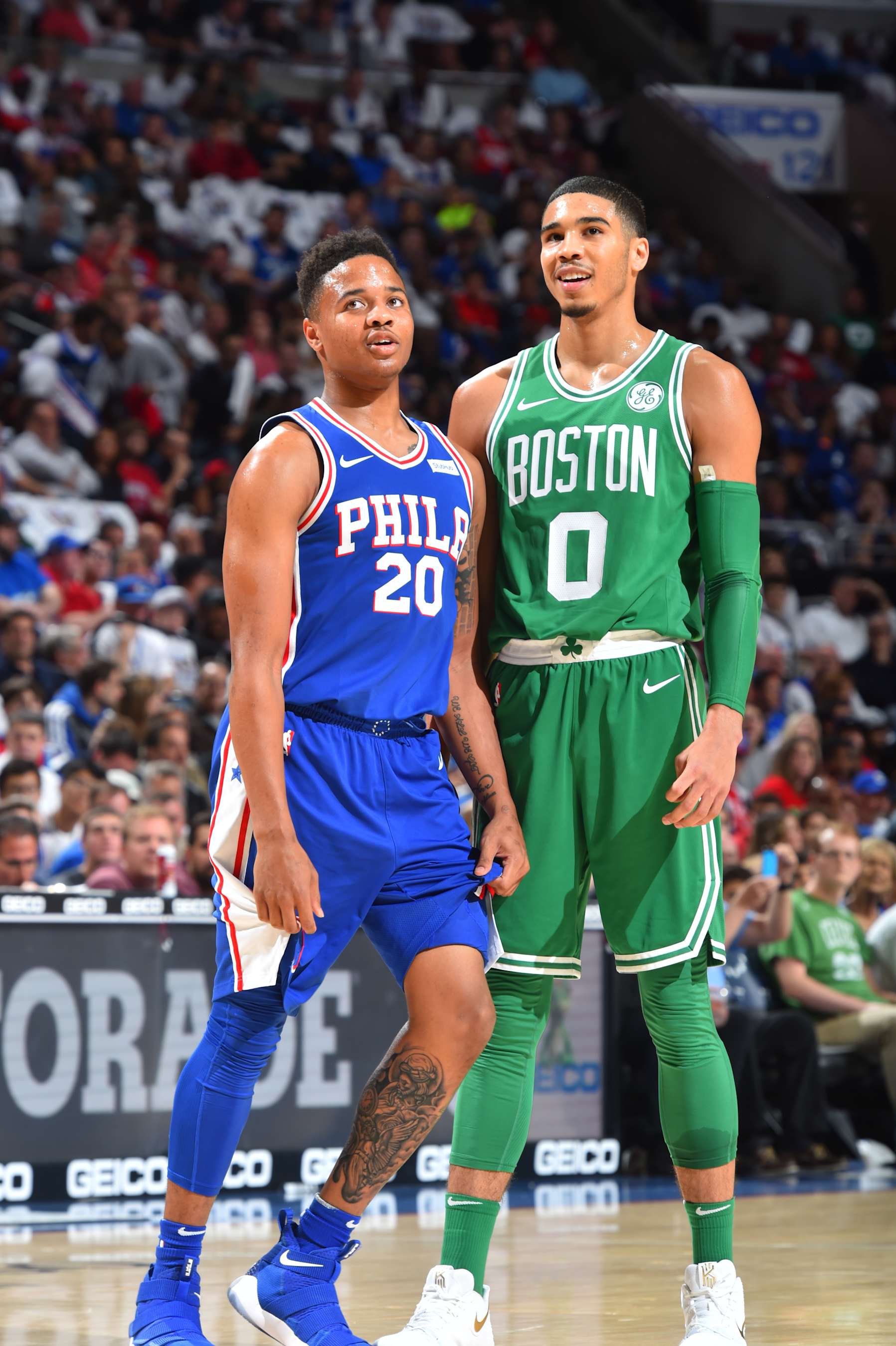 PHILADELPHIA, PA - OCTOBER 20:  Markelle Fultz #20 of the Philadelphia 76ers and Jayson Tatum #0 of the Boston Celtics are seen during the game on October 20, 2017 at Wells Fargo Center in Philadelphia, Pennsylvania. NOTE TO USER: User expressly acknowledges and agrees that, by downloading and or using this photograph, User is consenting to the terms and conditions of the Getty Images License Agreement. Mandatory Copyright Notice: Copyright 2017 NBAE (Photo by Jesse D. Garrabrant/NBAE via Getty Images)