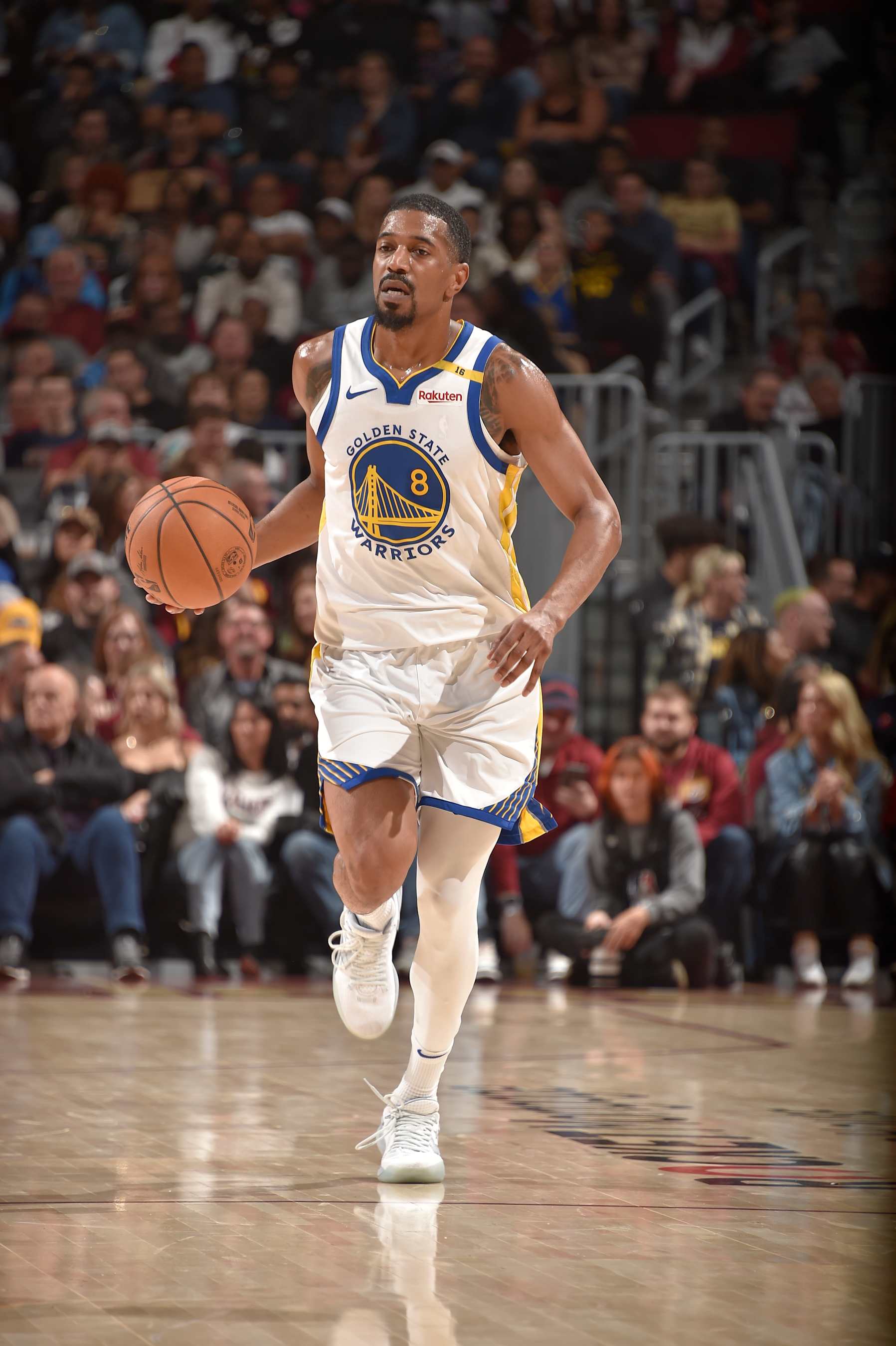 CLEVELAND, OH - NOVEMBER 8: De'Anthony Melton #8 of the Golden State Warriors dribbles the ball during the game against the Cleveland Cavaliers during a regular season game on November 8, 2024 at Rocket Mortgage FieldHouse in Cleveland, Ohio. NOTE TO USER: User expressly acknowledges and agrees that, by downloading and/or using this Photograph, user is consenting to the terms and conditions of the Getty Images License Agreement. Mandatory Copyright Notice: Copyright 2024 NBAE (Photo by David Liam Kyle/NBAE via Getty Images)