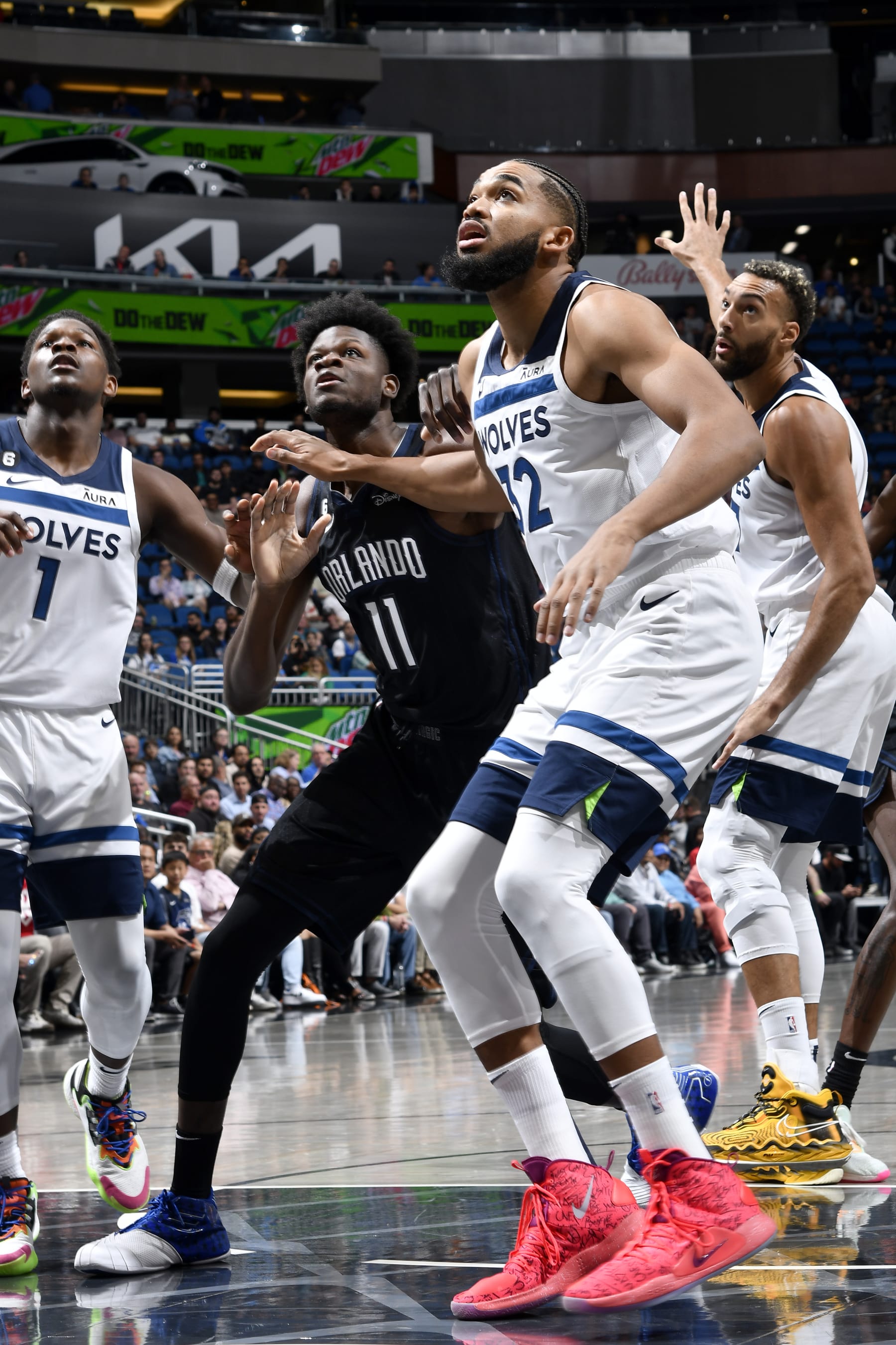 ORLANDO, FL - NOVEMBER 16: Anthony Edwards #1 of the Minnesota Timberwolves, Mo Bamba #11 of the Orlando Magic, Karl-Anthony Towns #32 of the Minnesota Timberwolves, and Rudy Gobert #27 of the Minnesota Timberwolves watch for the rebound during the game on November 16, 2022 at Amway Center in Orlando, Florida. NOTE TO USER: User expressly acknowledges and agrees that, by downloading and or using this photograph, User is consenting to the terms and conditions of the Getty Images License Agreement. Mandatory Copyright Notice: Copyright 2022 NBAE (Photo by Fernando Medina/NBAE via Getty Images)