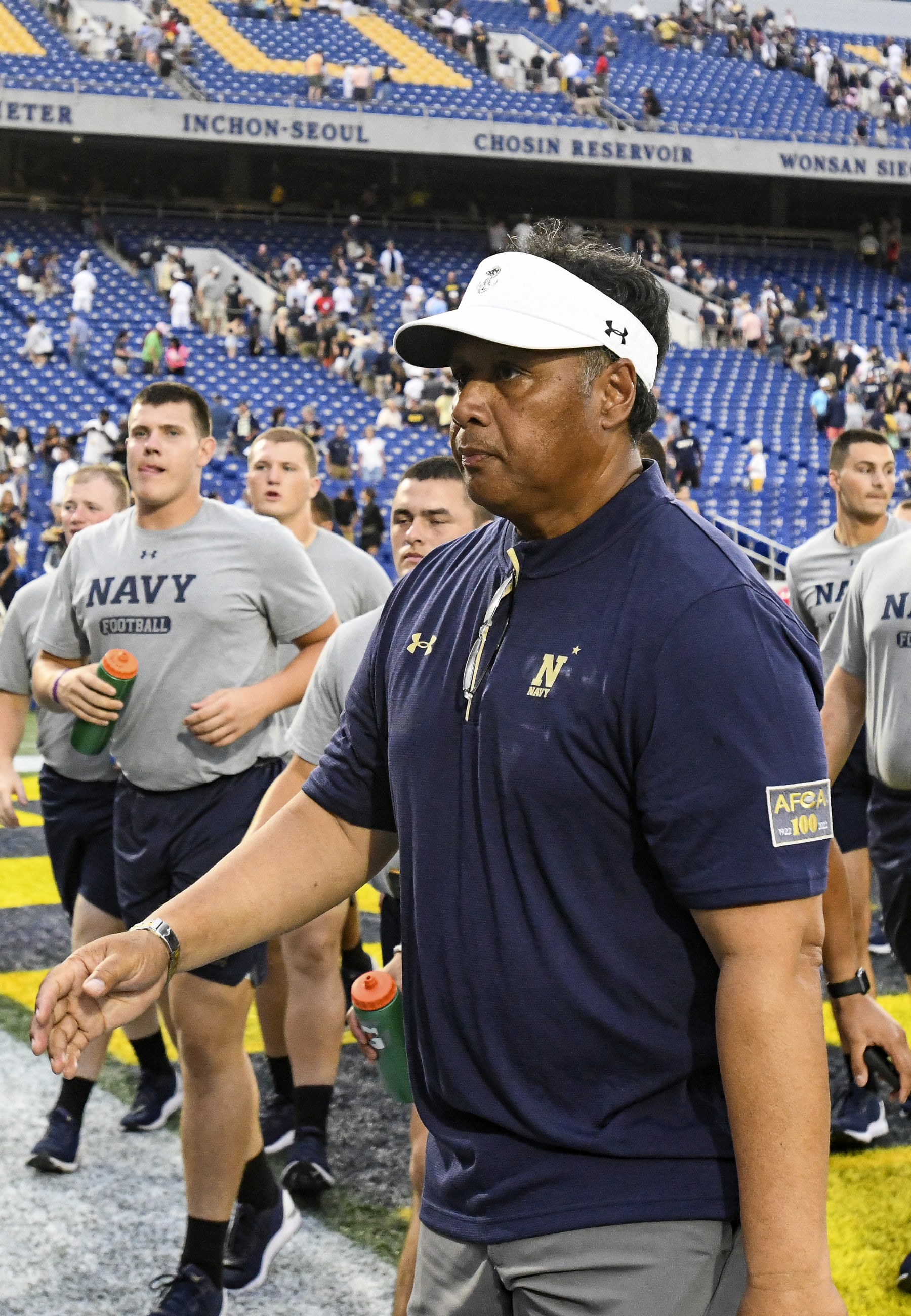 ANNAPOLIS, MD - SEPTEMBER 10:  Navy Midshipmen head coach Ken Niumatalolo walks off the field following the Memphis Tigers game versus the Naval Academy Midshipmen on September 10, 2022 at Navy - Marine Corps Memorial Stadium in Annapolis, MD. (Photo by Mark Goldman/Icon Sportswire via Getty Images)