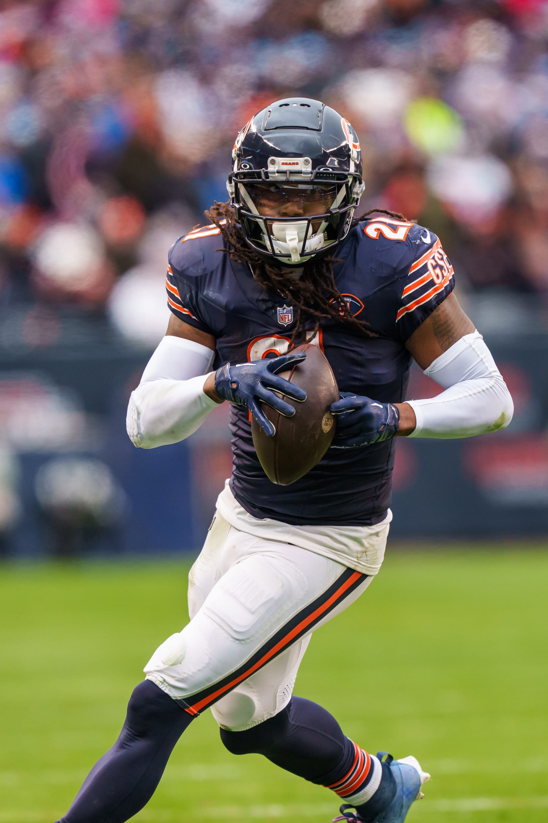 CHICAGO, IL - DECEMBER 10:  Running back D'Onta Foreman #21 of the Chicago Bears runs the ball during an NFL football game against the Detroit Lions at Soldier Field on December 10, 2023 in Chicago, Illinois. The Bears beat the Lions 28-13. (Photo by Todd Rosenberg/Getty Images)