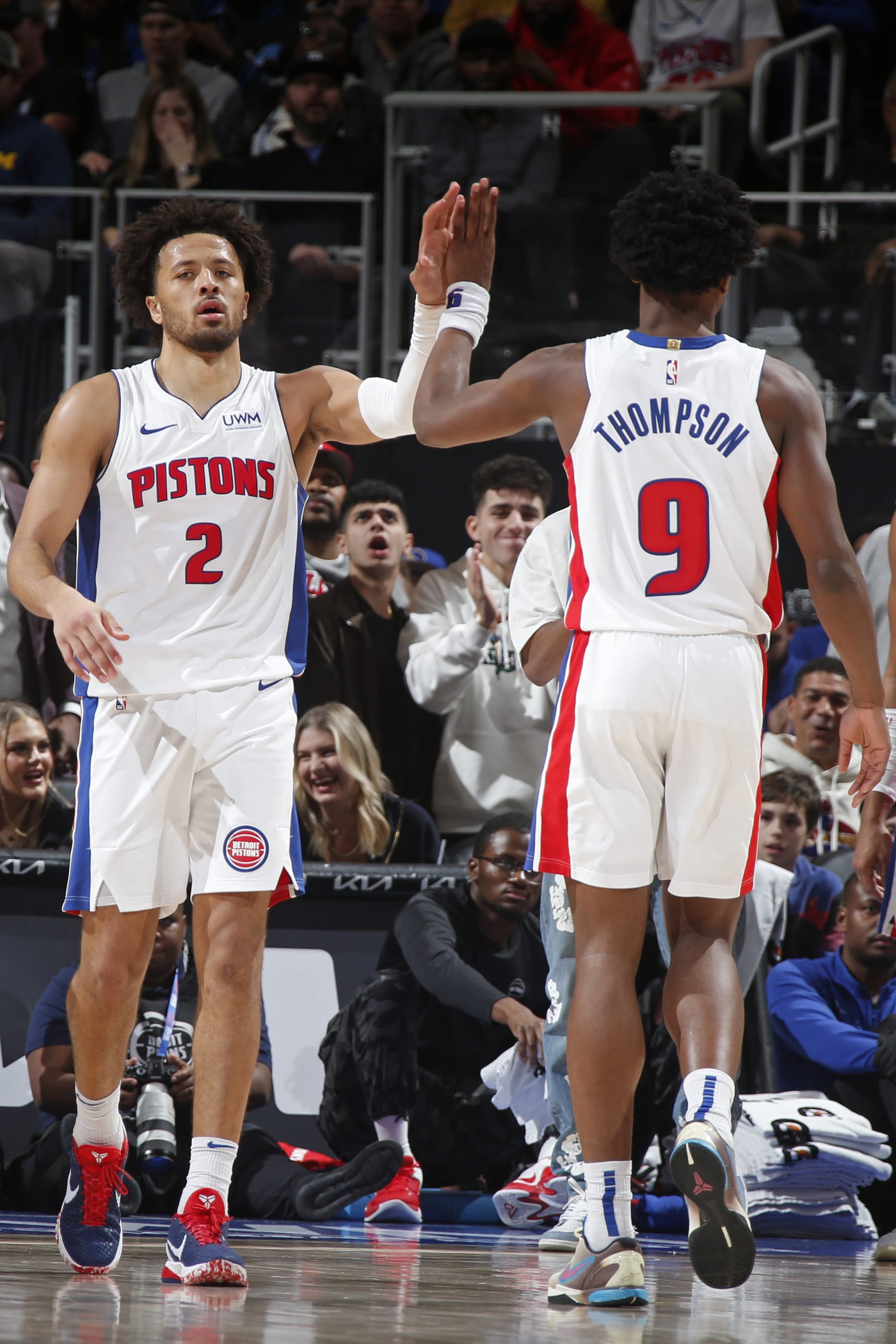 DETROIT, MI - NOVEMBER 6: Cade Cunningham #2 and Ausar Thompson #9 of the Detroit Pistons high five during the game against the Golden State Warriors on November 6, 2023 at Little Caesars Arena in Detroit, Michigan. NOTE TO USER: User expressly acknowledges and agrees that, by downloading and/or using this photograph, User is consenting to the terms and conditions of the Getty Images License Agreement. Mandatory Copyright Notice: Copyright 2023 NBAE (Photo by Brian Sevald/NBAE via Getty Images)