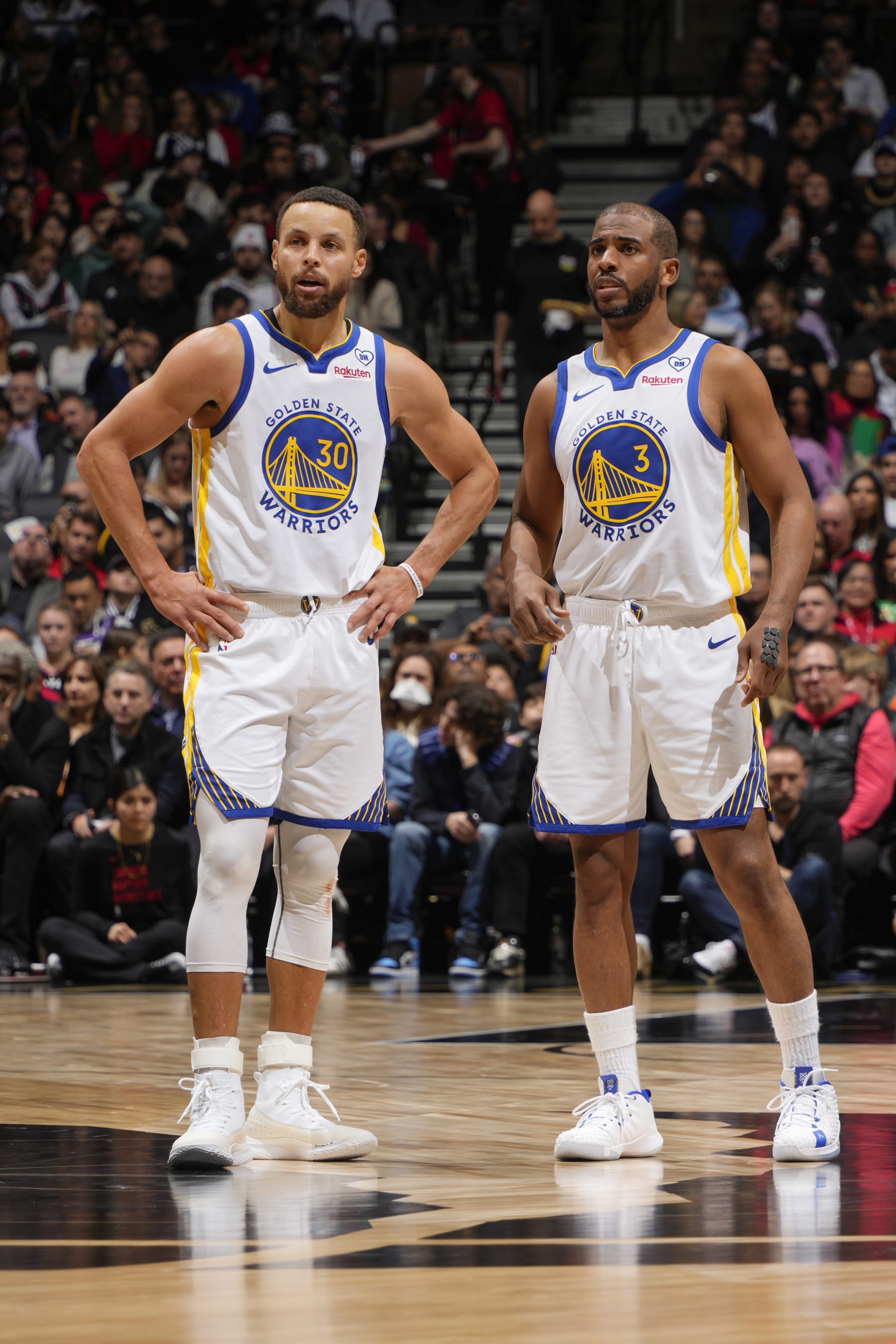 TORONTO, CANADA - MARCH 1:  Stephen Curry #30 of the Golden State Warriors 7 Chris Paul #3 of the Golden State Warriors looks on during the game on March 1, 2024 at the Scotiabank Arena in Toronto, Ontario, Canada.  NOTE TO USER: User expressly acknowledges and agrees that, by downloading and or using this Photograph, user is consenting to the terms and conditions of the Getty Images License Agreement.  Mandatory Copyright Notice: Copyright 2024 NBAE (Photo by Mark Blinch/NBAE via Getty Images)