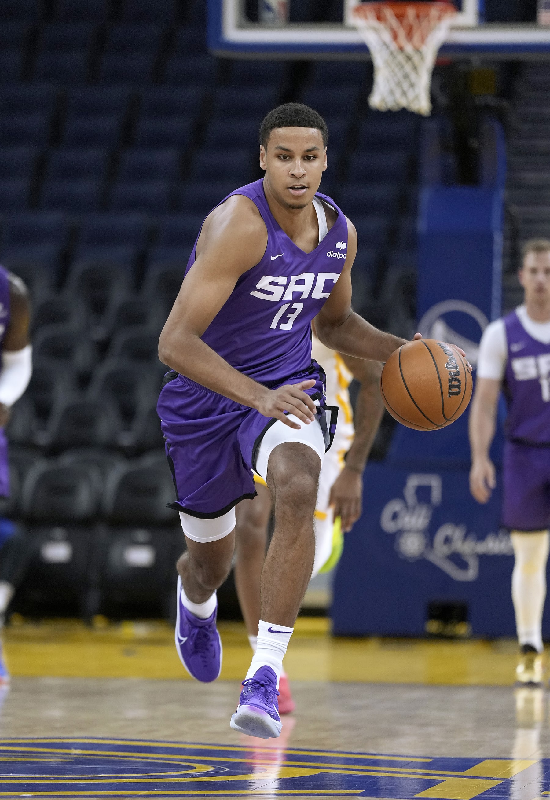 SAN FRANCISCO, CALIFORNIA - JULY 05: Keegan Murray #13 of the Sacramento Kings dribbling the ball up courtagainst the Los Angeles Lakers in the first half during the California Classic at Chase Center on July 05, 2022 in San Francisco, California. NOTE TO USER: User expressly acknowledges and agrees that, by downloading and or using this photograph, User is consenting to the terms and conditions of the Getty Images License Agreement. (Photo by Thearon W. Henderson/Getty Images)