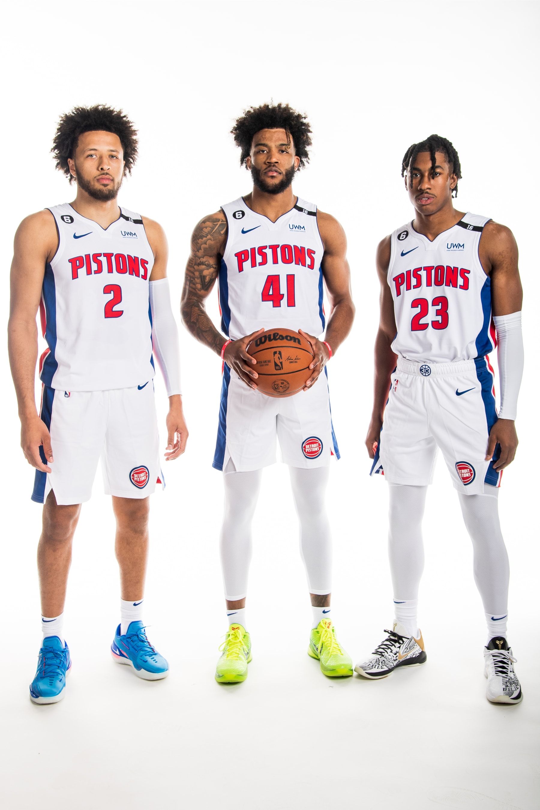 DETROIT, MICHIGAN - SEPTEMBER 26: Cade Cunningham #2 of the Detroit Pistons, Saddiq Bey #41 of the Detroit Pistons, and Jayden Ivey #23 of the Detroit Pistons pose for a portrait during the Detroit Pistons Media Day at Little Caesars Arena on September 26, 2022 in Detroit, Michigan. NOTE TO USER: User expressly acknowledges and agrees that, by downloading and or using this photograph, User is consenting to the terms and conditions of the Getty Images License Agreement. Mandatory Copyright Notice: Copyright 2022 NBAE (Photo by Chris Schwegler/NBAE via Getty Images)