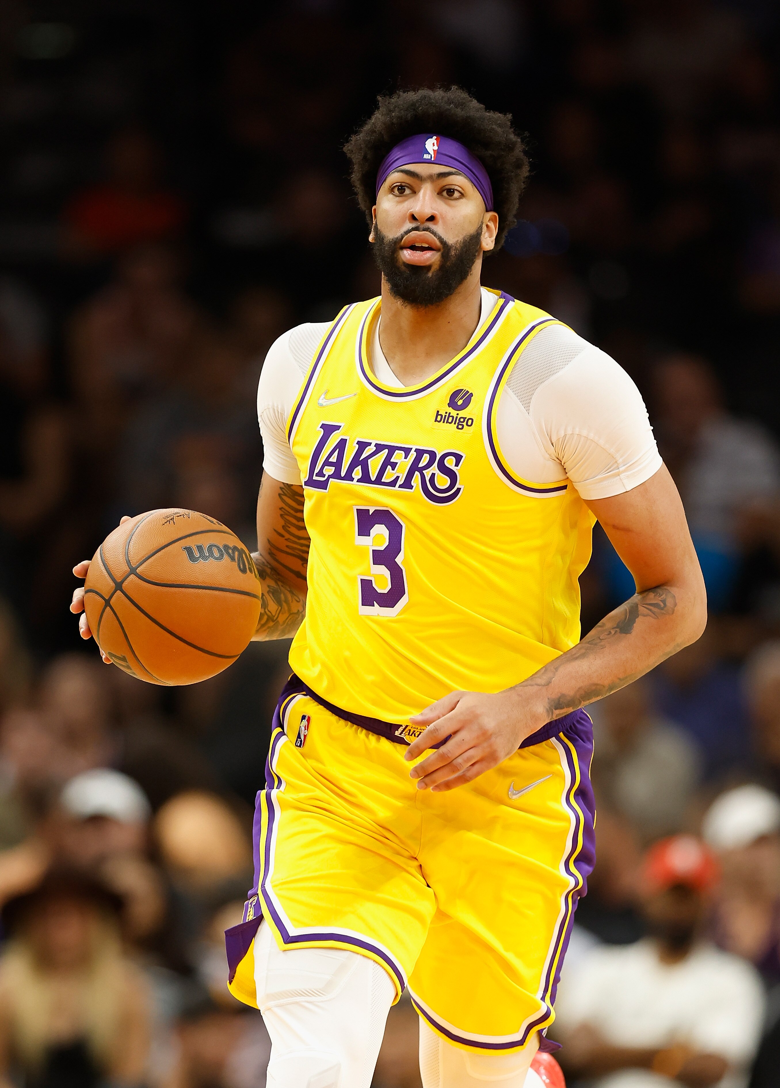 PHOENIX, ARIZONA - APRIL 05: Anthony Davis #3 of the Los Angeles Lakers handles the ball during the first half of the NBA game against the Phoenix Suns at Footprint Center on April 05, 2022 in Phoenix, Arizona.  The Suns defeated the Lakers 121-110.  NOTE TO USER: User expressly acknowledges and agrees that, by downloading and or using this photograph, User is consenting to the terms and conditions of the Getty Images License Agreement. (Photo by Christian Petersen/Getty Images)
