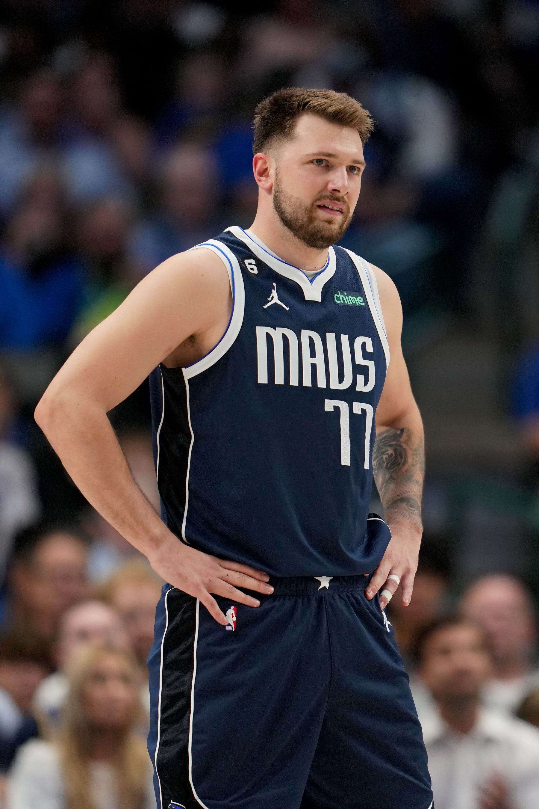 DALLAS, TX - MARCH 22:  Luka Doncic #77 of the Dallas Mavericks looks on during the game against the Golden State Warriors on March 22, 2023 at the American Airlines Center in Dallas, Texas. NOTE TO USER: User expressly acknowledges and agrees that, by downloading and or using this photograph, User is consenting to the terms and conditions of the Getty Images License Agreement. Mandatory Copyright Notice: Copyright 2023 NBAE (Photo by Cooper Neill/NBAE via Getty Images)