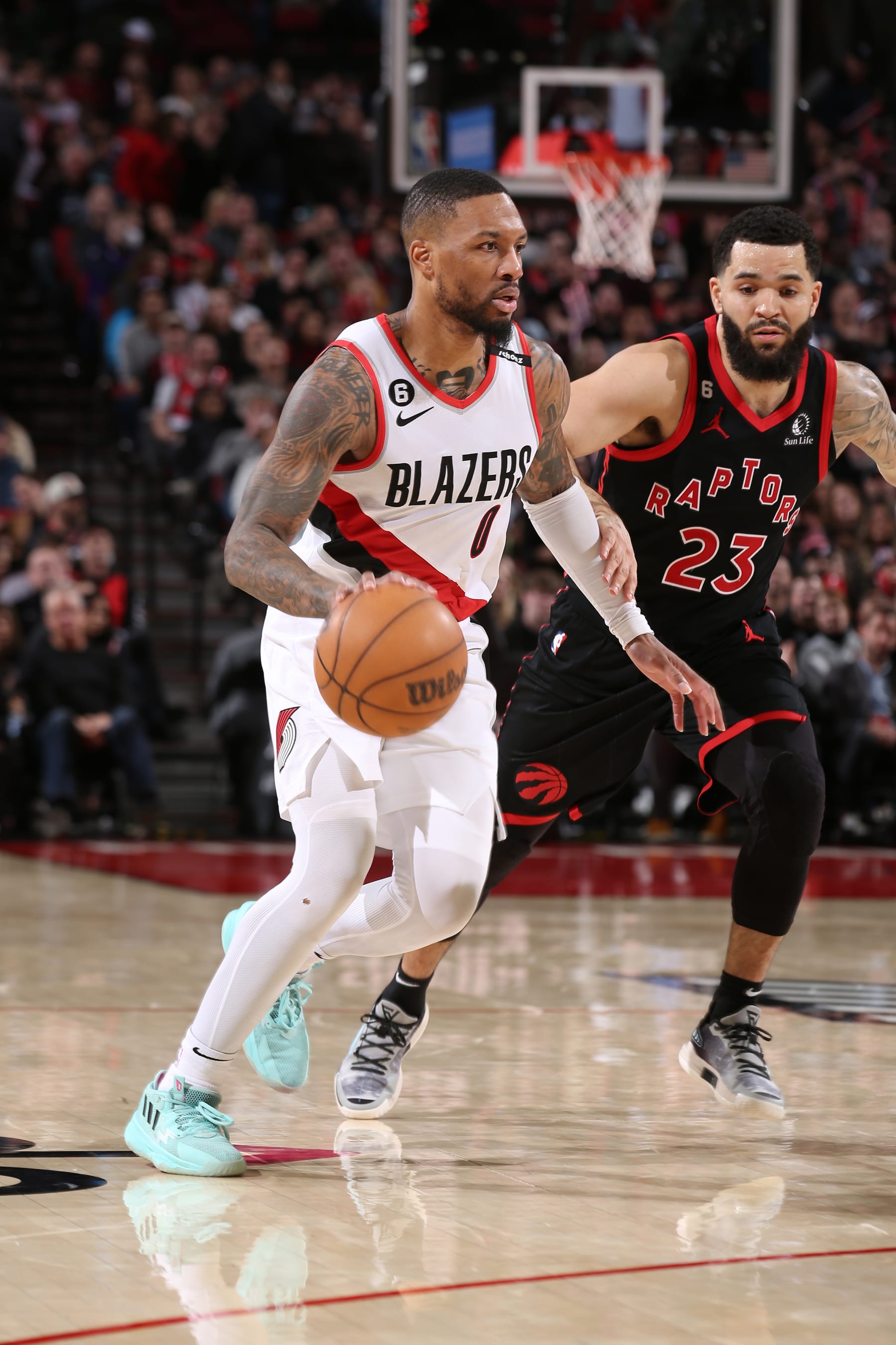 PORTLAND, OR - JANUARY 28: Damian Lillard #0 of the Portland Trail Blazers dribbles the ball during the game against the Toronto Raptors on January 28, 2023 at the Moda Center Arena in Portland, Oregon. NOTE TO USER: User expressly acknowledges and agrees that, by downloading and or using this photograph, user is consenting to the terms and conditions of the Getty Images License Agreement. Mandatory Copyright Notice: Copyright 2023 NBAE (Photo by Cameron Browne/NBAE via Getty Images)