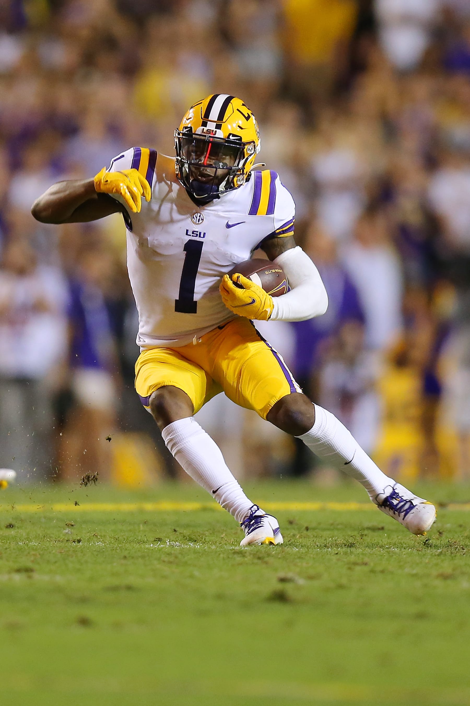 BATON ROUGE, LOUISIANA - OCTOBER 02: Kayshon Boutte #1 of the LSU Tigers runs with the ball against the Auburn Tigers during a game at Tiger Stadium on October 02, 2021 in Baton Rouge, Louisiana. (Photo by Jonathan Bachman/Getty Images)