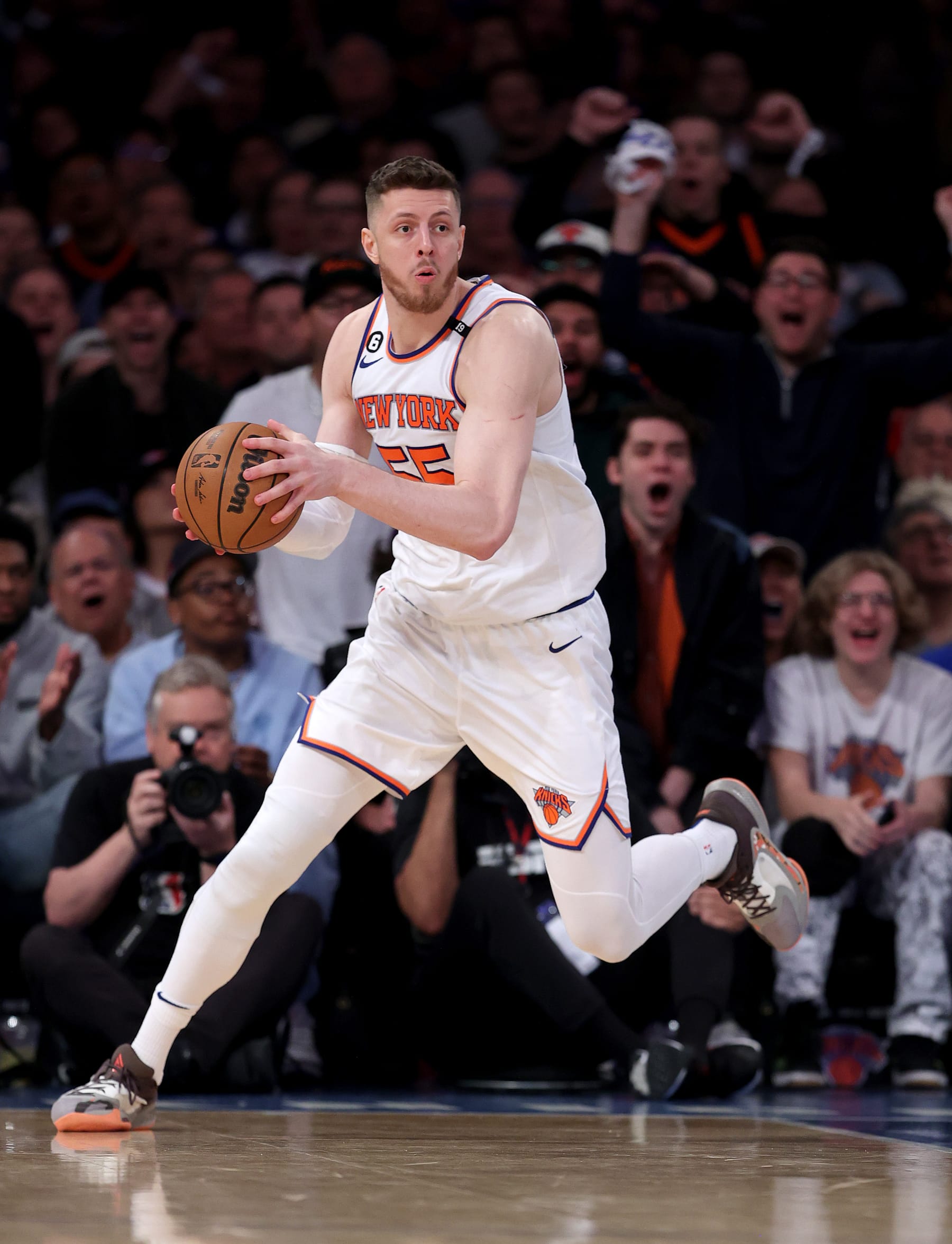 NEW YORK, NEW YORK - APRIL 23: Isaiah Hartenstein #55 of the New York Knicks grabs the rebound in the second half against the Cleveland Cavaliers during Game Four of the Eastern Conference First Round Playoffs at Madison Square Garden on April 23, 2023 in New York City. The New York Knicks defeated the Cleveland Cavaliers 102-93. NOTE TO USER: User expressly acknowledges and agrees that, by downloading and or using this photograph, User is consenting to the terms and conditions of the Getty Images License Agreement. (Photo by Elsa/Getty Images)