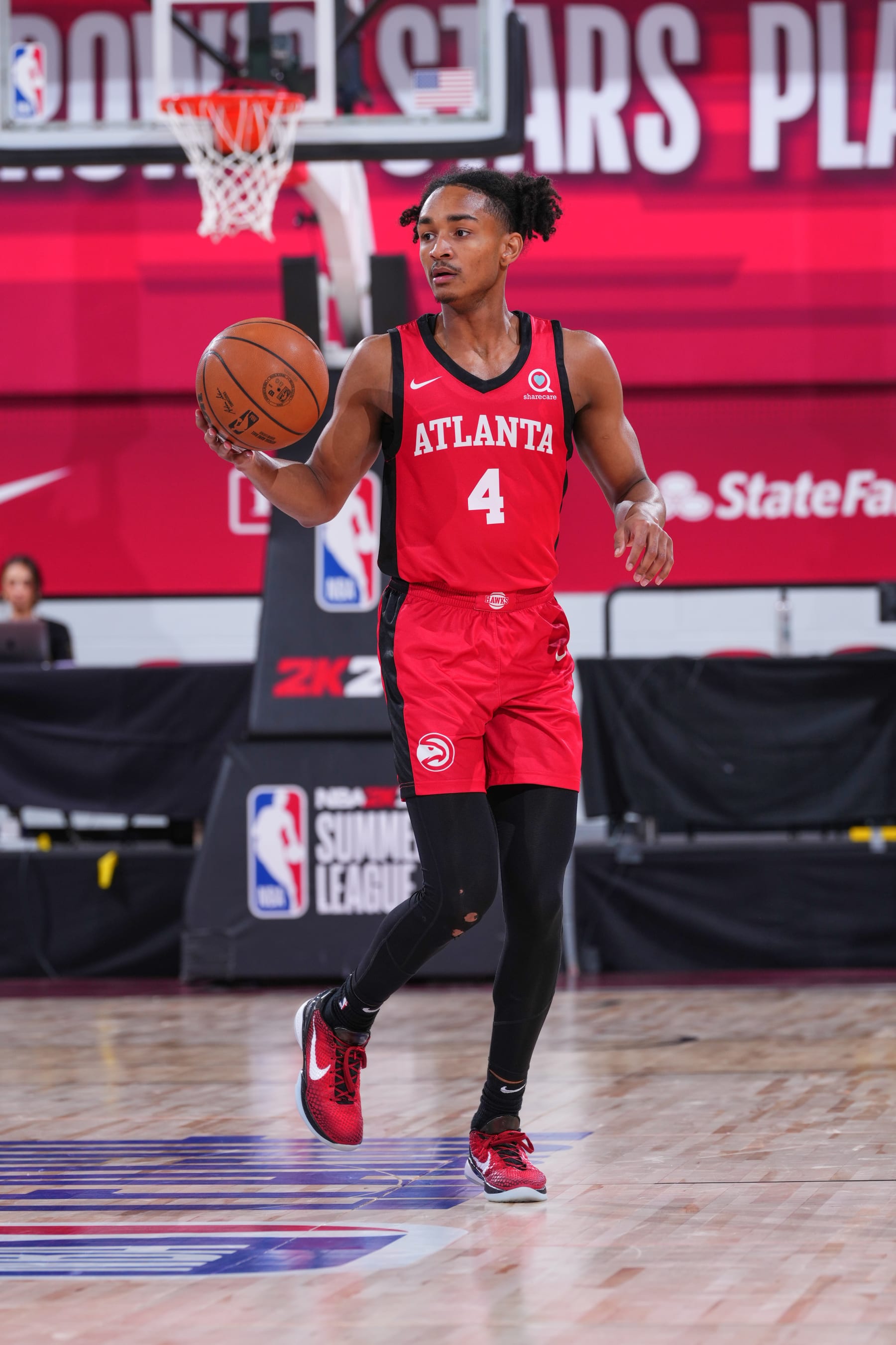 LAS VEGAS, NV - JULY 16:  Kobe Bufkin #4 of the Atlanta Hawks goes to the basket during the game during the 2023 NBA Las Vegas Summer League on July 16, 2023 at the The Cox Pavillion  in Las Vegas, Nevada. NOTE TO USER: User expressly acknowledges and agrees that, by downloading and or using this Photograph, User is consenting to the terms and conditions of the Getty Images License Agreement. Mandatory Copyright Notice: Copyright 2023 NBAE (Photo by Jeff Bottari/NBAE via Getty Images)
