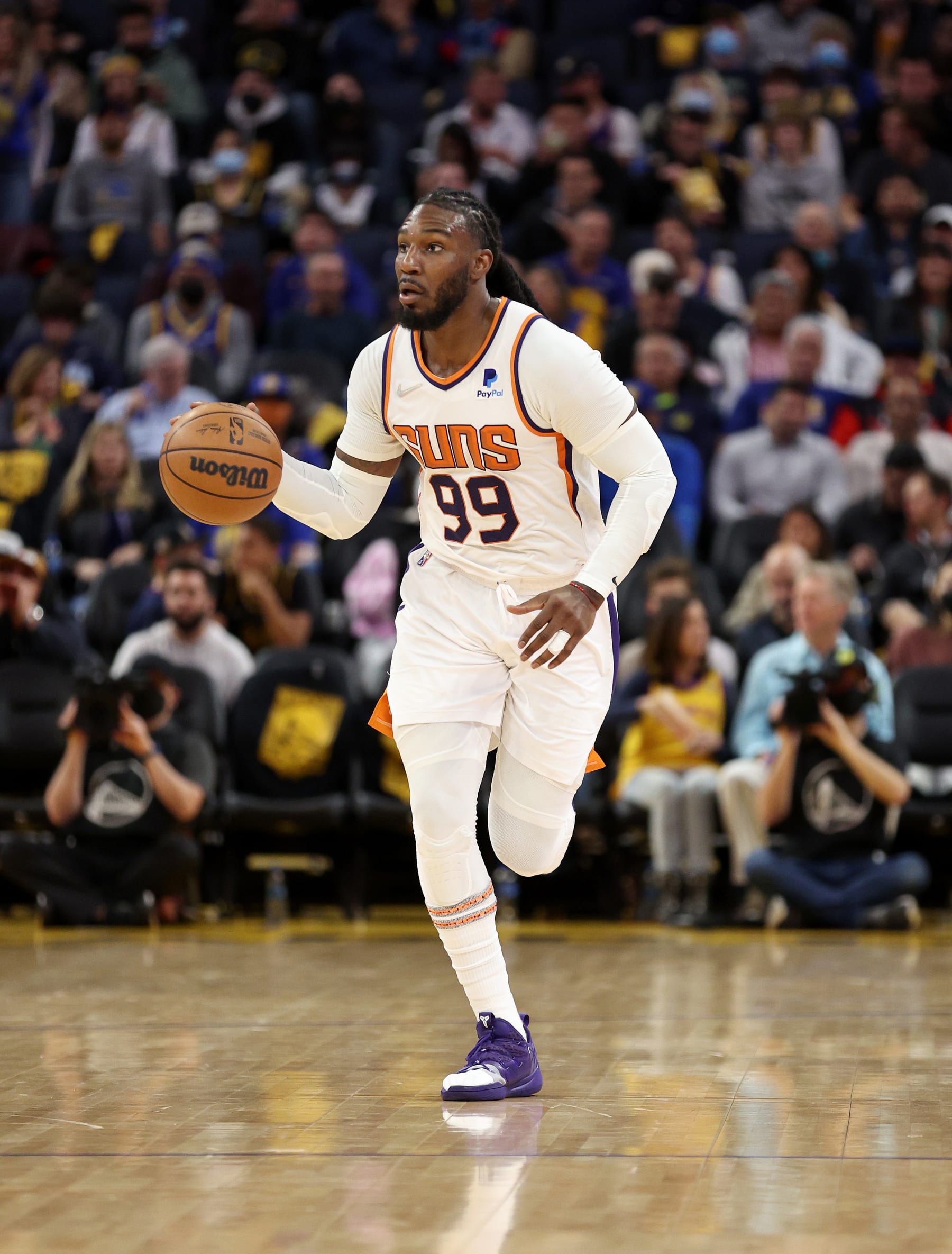SAN FRANCISCO, CALIFORNIA - MARCH 30:  Jae Crowder #99 of the Phoenix Suns in action against the Golden State Warriors at Chase Center on March 30, 2022 in San Francisco, California. NOTE TO USER: User expressly acknowledges and agrees that, by downloading and/or using this photograph, User is consenting to the terms and conditions of the Getty Images License Agreement.  (Photo by Ezra Shaw/Getty Images)