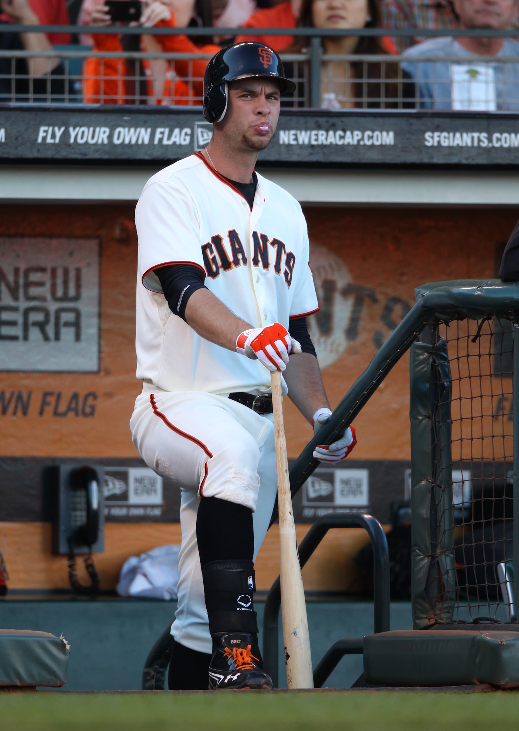 SAN FRANCISCO, CA - SEPTEMBER 9:  Brandon Belt #9 of the San Francisco Giants waits in the dugout for his next at bat during the game against the Los Angeles Dodgers at AT&T Park on Sunday, September 9, 2012 in San Francisco, California. (Photo by Brad Mangin/MLB Photos via Getty Images) 