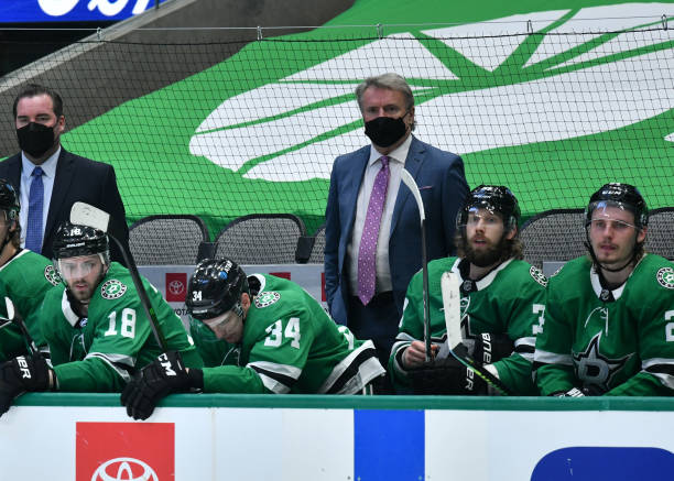 DALLAS, TX - MARCH 25: Rick Bowness of the Dallas Stars watches the action from behind the bench against the Tampa Bay Lightning at the American Airlines Center on March 25, 2021 in Dallas, Texas. (Photo by Glenn James/NHLI via Getty Images)