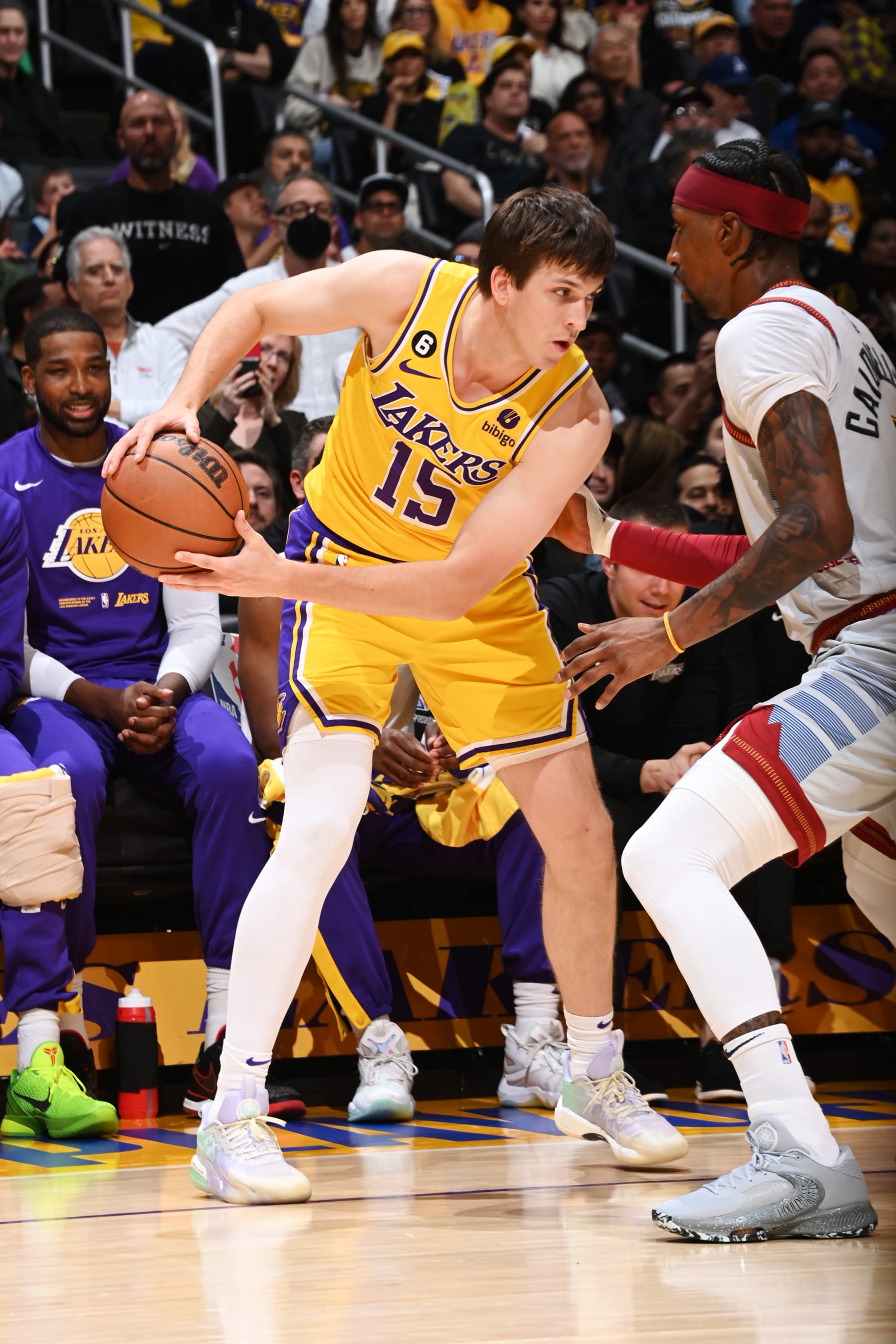 LOS ANGELES, CA - MAY 22: Austin Reaves #15 of the Los Angeles Lakers looks to pass the ball during Round 3 Game 4 of the Western Conference Finals 2023 NBA Playoffs against the Denver Nuggets on May 22, 2023 at Crypto.Com Arena in Los Angeles, California. NOTE TO USER: User expressly acknowledges and agrees that, by downloading and/or using this Photograph, user is consenting to the terms and conditions of the Getty Images License Agreement. Mandatory Copyright Notice: Copyright 2023 NBAE (Photo by Andrew D. Bernstein/NBAE via Getty Images)