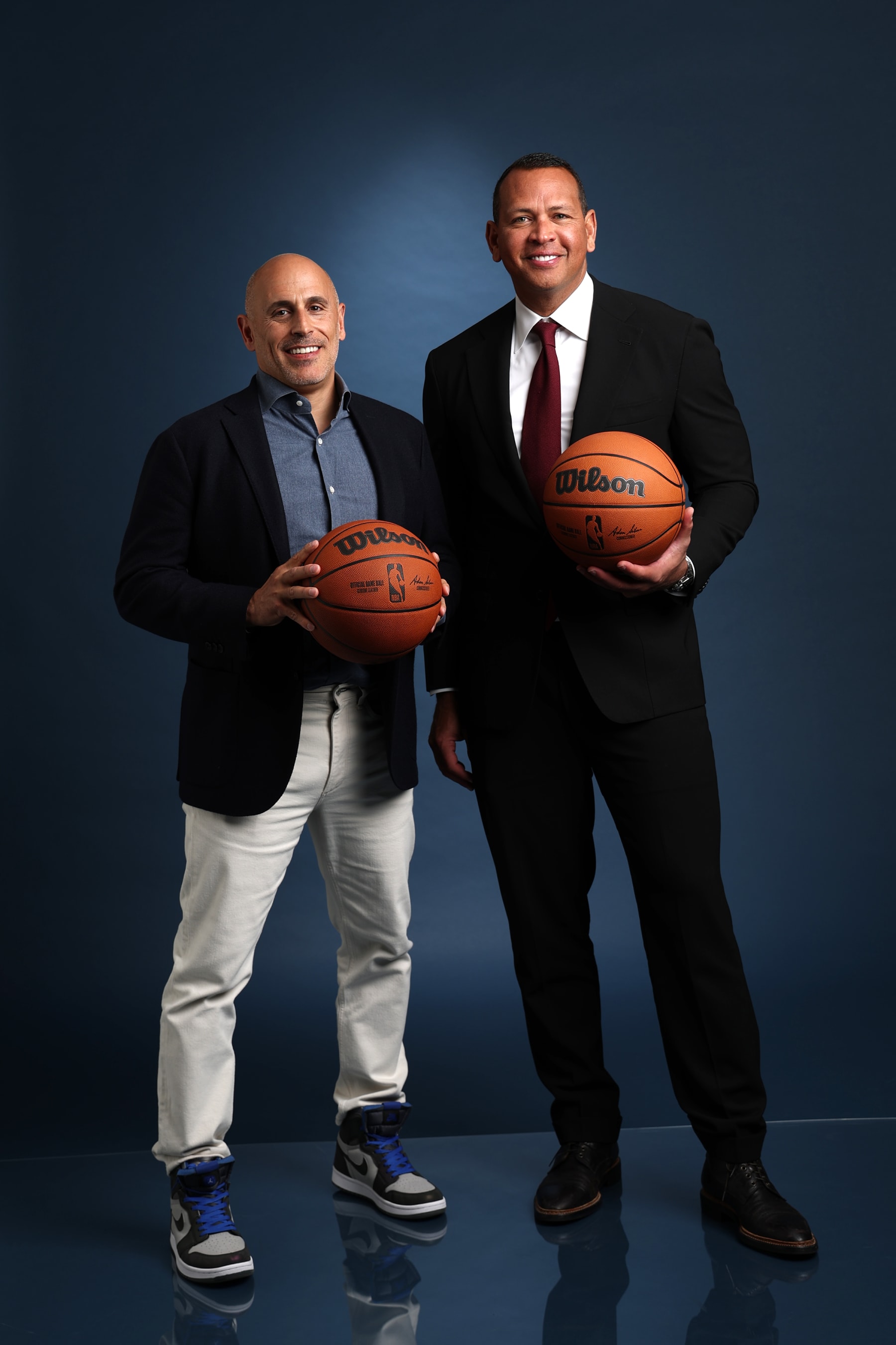 MINNEAPOLIS, MN - MAY 31:  Marc Lore and Alex Rodriguez, Co-Owners of the Minnesota Timberwolves, pose for a portrait during the event to introduce Tim Connelly, new Minnesota Timberwolves President of Basketball Operations, by team ownership group Glen Taylor, Marc Lore and Alex Rodriguez on May 31, 2022 at the Minnesota Timberwolves and Lynx Courts at Mayo Clinic Square in Minneapolis, Minnesota.  NOTE TO USER:  User expressly acknowledges and agrees that, by downloading and or using this Photograph, user is consenting to the terms and conditions of the Getty Images License Agreement. Mandatory Copyright Notice: Copyright 2021 NBAE (Photo by David Sherman/NBAE via Getty Images)