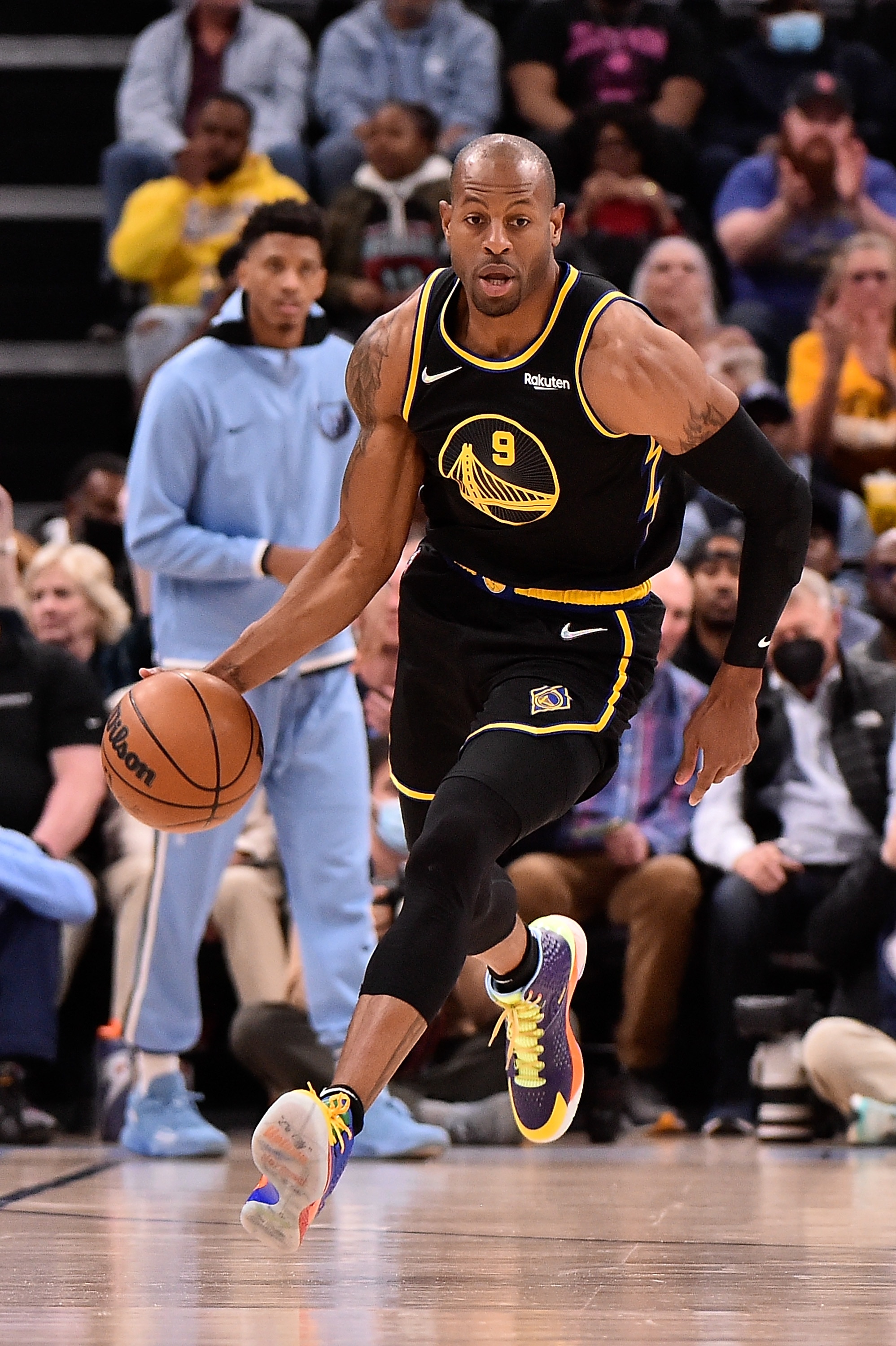 MEMPHIS, TENNESSEE - MARCH 28: Andre Iguodala #9 of the Golden State Warriors brings the ball up court during the game against the Memphis Grizzlies at FedExForum on March 28, 2022 in Memphis, Tennessee. NOTE TO USER: User expressly acknowledges and agrees that , by downloading and or using this photograph, User is consenting to the terms and conditions of the Getty Images License Agreement. (Photo by Justin Ford/Getty Images) MEMPHIS, TENNESSEE - MARCH 28: Andre Iguodala #9 of the Golden State Warriors brings the ball up court during the game against the Memphis Grizzlies at FedExForum on March 28, 2022 in Memphis, Tennessee. NOTE TO USER: User expressly acknowledges and agrees that , by downloading and or using this photograph, User is consenting to the terms and conditions of the Getty Images License Agreement. (Photo by Justin Ford/Getty Images)