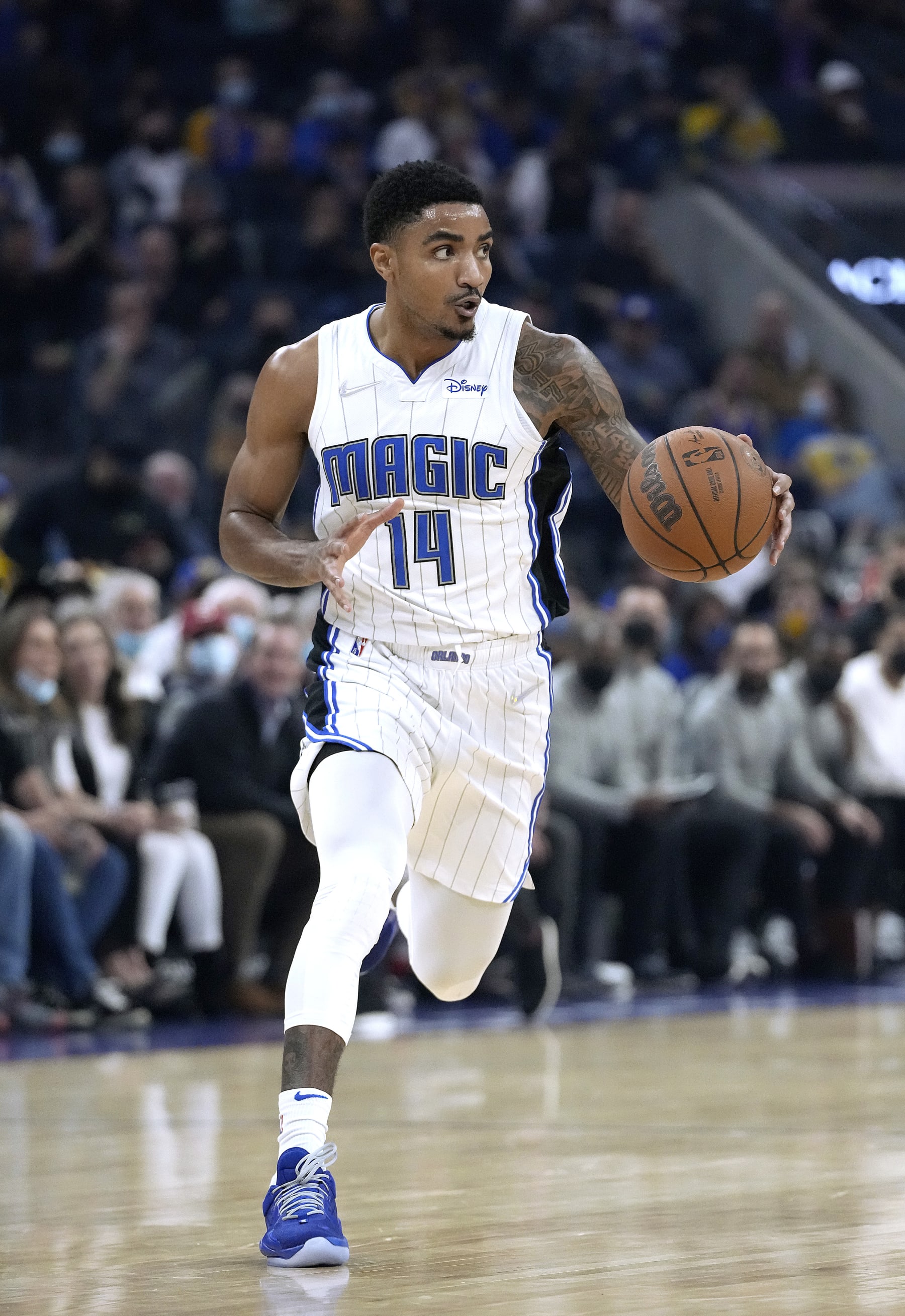 SAN FRANCISCO, CALIFORNIA - DECEMBER 06: Gary Harris #14 of the Orlando Magic dribbles the ball up court against the Golden State Warriors during the first quarter of an NBA basketball game at Chase Center on December 06, 2021 in San Francisco, California. NOTE TO USER: User expressly acknowledges and agrees that, by downloading and or using this photograph, User is consenting to the terms and conditions of the Getty Images License Agreement. (Photo by Thearon W. Henderson/Getty Images)