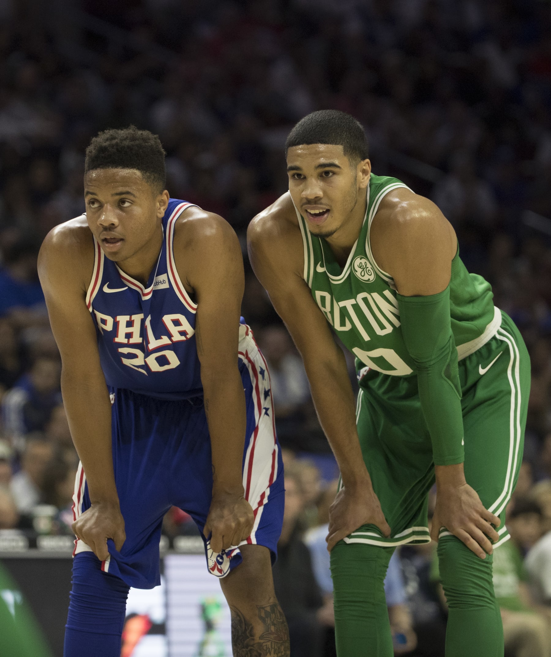 PHILADELPHIA, PA - OCTOBER 20: Markelle Fultz #20 of the Philadelphia 76ers stands next to Jayson Tatum #0 of the Boston Celtics during foul shots in the first half at the Wells Fargo Center on October 20, 2017 in Philadelphia, Pennsylvania. The Celtics defeated the 76ers 102-92. NOTE TO USER: User expressly acknowledges and agrees that, by downloading and or using this photograph, User is consenting to the terms and conditions of the Getty Images License Agreement. (Photo by Mitchell Leff/Getty Images)