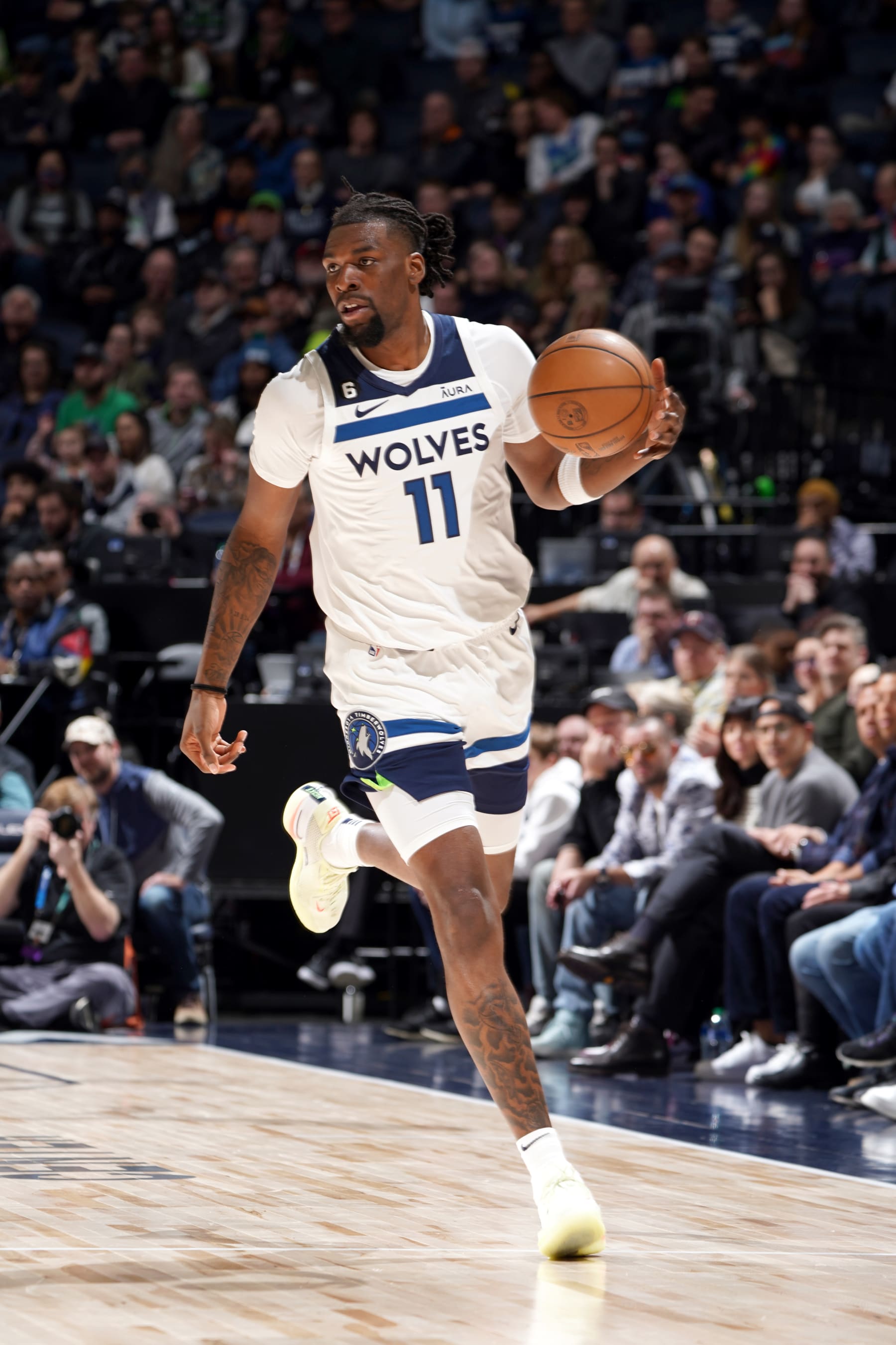 MINNEAPOLIS, MN -  JANUARY 16: Naz Reid #11 of the Minnesota Timberwolves moves the ball during the game against the Utah Jazz on January 16, 2023 at Target Center in Minneapolis, Minnesota. NOTE TO USER: User expressly acknowledges and agrees that, by downloading and or using this Photograph, user is consenting to the terms and conditions of the Getty Images License Agreement. Mandatory Copyright Notice: Copyright 2023 NBAE (Photo by Jordan Johnson/NBAE via Getty Images)