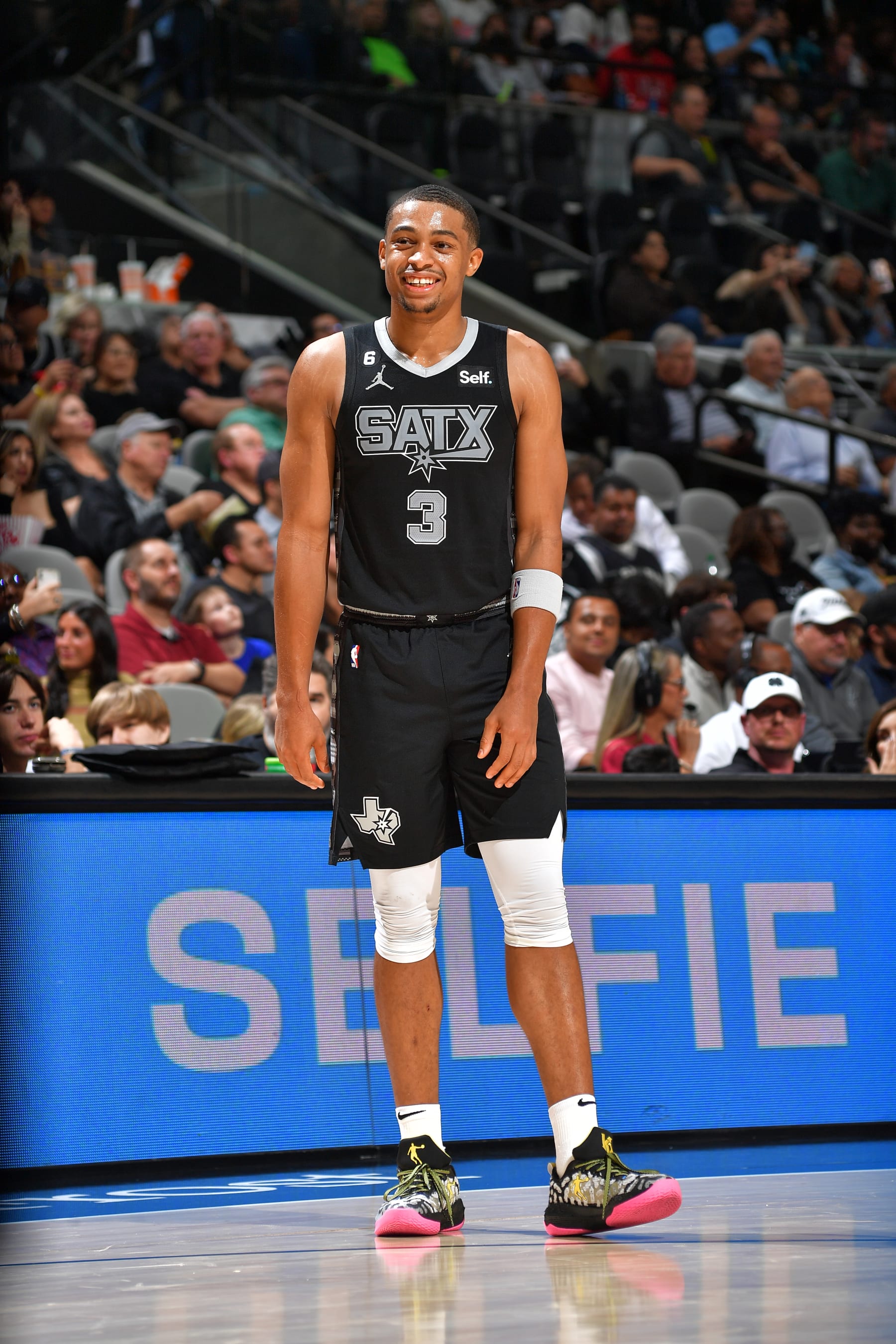 SAN ANTONIO, TX - OCTOBER 28: Keldon Johnson #3 of the San Antonio Spurs smiles on the court during the game against the Chicago Bulls on October 28, 2022 at the AT&T Center in San Antonio, Texas. NOTE TO USER: User expressly acknowledges and agrees that, by downloading and or using this photograph, user is consenting to the terms and conditions of the Getty Images License Agreement. Mandatory Copyright Notice: Copyright 2022 NBAE (Photos by Michael Gonzales/NBAE via Getty Images)