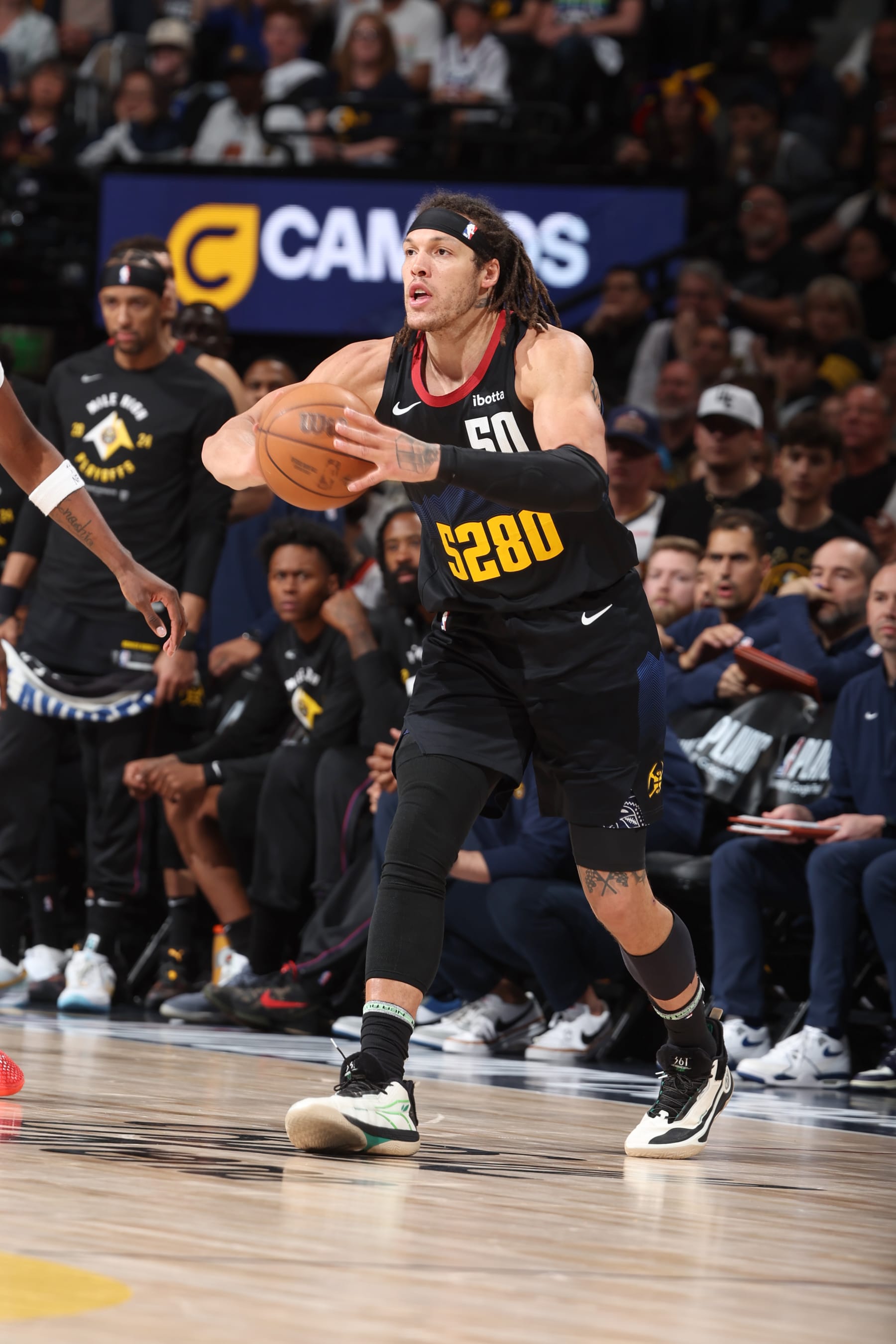 DENVER, CO - MAY 14:  Aaron Gordon #50 of the Denver Nuggets passes the ball during the game  against the Minnesota Timberwolves during Round 2 Game 5 of the 2024 NBA Playoffs  on May 14, 2024 at the Ball Arena in Denver, Colorado. NOTE TO USER: User expressly acknowledges and agrees that, by downloading and/or using this Photograph, user is consenting to the terms and conditions of the Getty Images License Agreement. Mandatory Copyright Notice: Copyright 2024 NBAE (Photo by David Sherman/NBAE via Getty Images)
