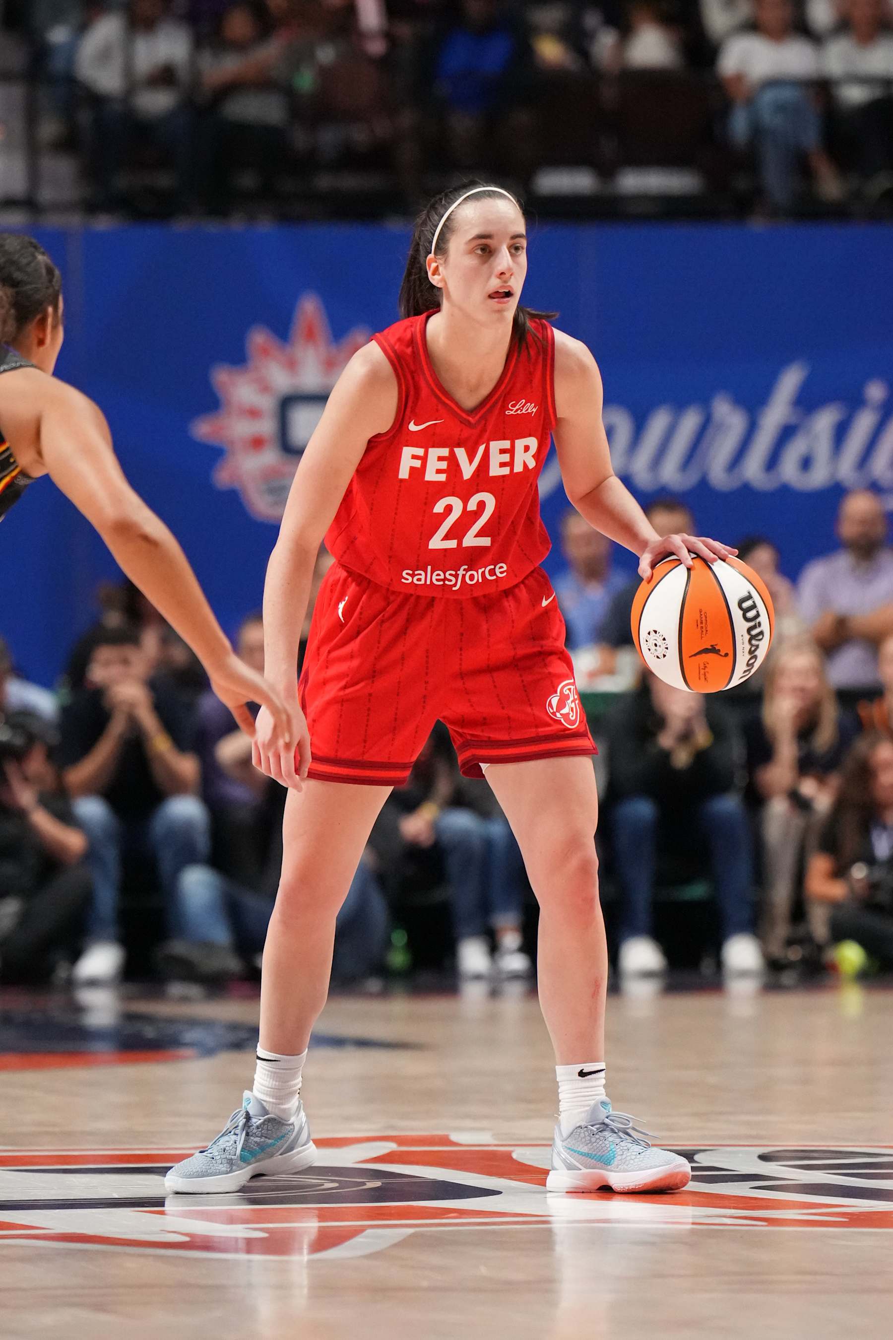 UNCASVILLE, CT - SEPTEMBER 25: Caitlin Clark #22 of the Indiana Fever dribbles the ball during the game against the Connecticut Sun during Round one Game two of the 2024 WNBA Playoffs on September 25, 2024 at the Mohegan Sun Arena in Uncasville, Connecticut. NOTE TO USER: User expressly acknowledges and agrees that, by downloading and or using this photograph, User is consenting to the terms and conditions of the Getty Images License Agreement. Mandatory Copyright Notice: Copyright 2024 NBAE (Photo by Jesse D. Garrabrant/NBAE via Getty Images)