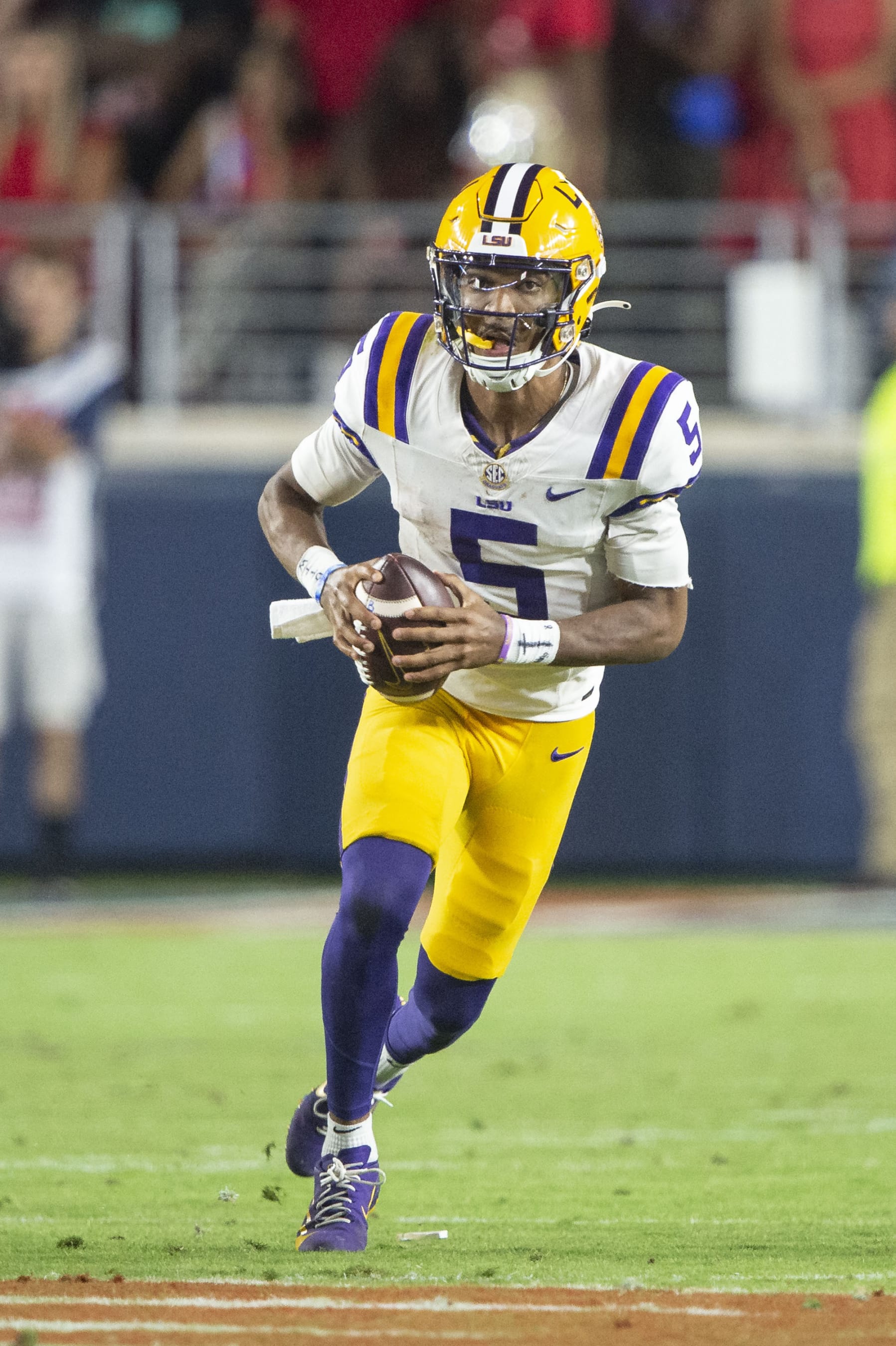 OXFORD, MISSISSIPPI - SEPTEMBER 30: Quarterback Jayden Daniels #5 of the LSU Tigers during their game against the Mississippi Rebels at Vaught-Hemingway Stadium on September 30, 2023 in Oxford, Mississippi. (Photo by Michael Chang/Getty Images)