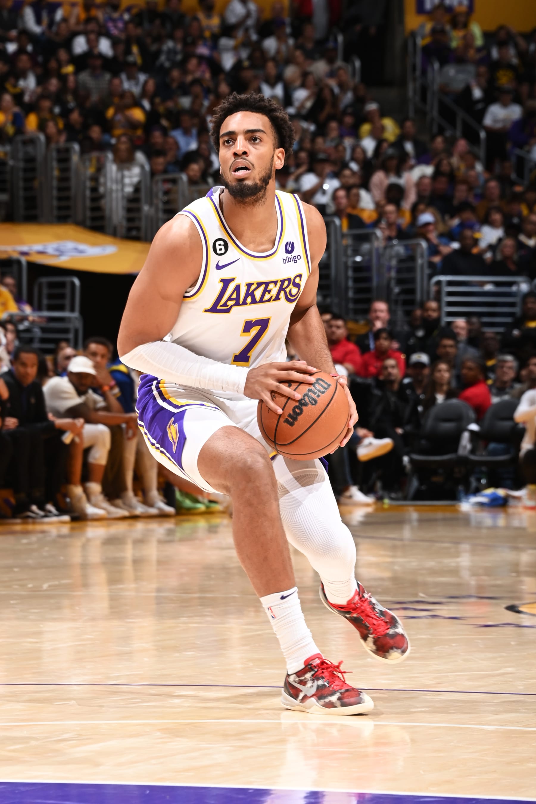 LOS ANGELES, CA - MAY 6: Troy Brown Jr. #7 of the Los Angeles Lakers dribbles the ball during Round 2 Game 3 of the Western Conference Semi-Finals 2023 NBA Playoffs against the Golden State Warriors on May 6, 2023 at Crypto.Com Arena in Los Angeles, California. NOTE TO USER: User expressly acknowledges and agrees that, by downloading and/or using this Photograph, user is consenting to the terms and conditions of the Getty Images License Agreement. Mandatory Copyright Notice: Copyright 2023 NBAE (Photo by Andrew D. Bernstein/NBAE via Getty Images)