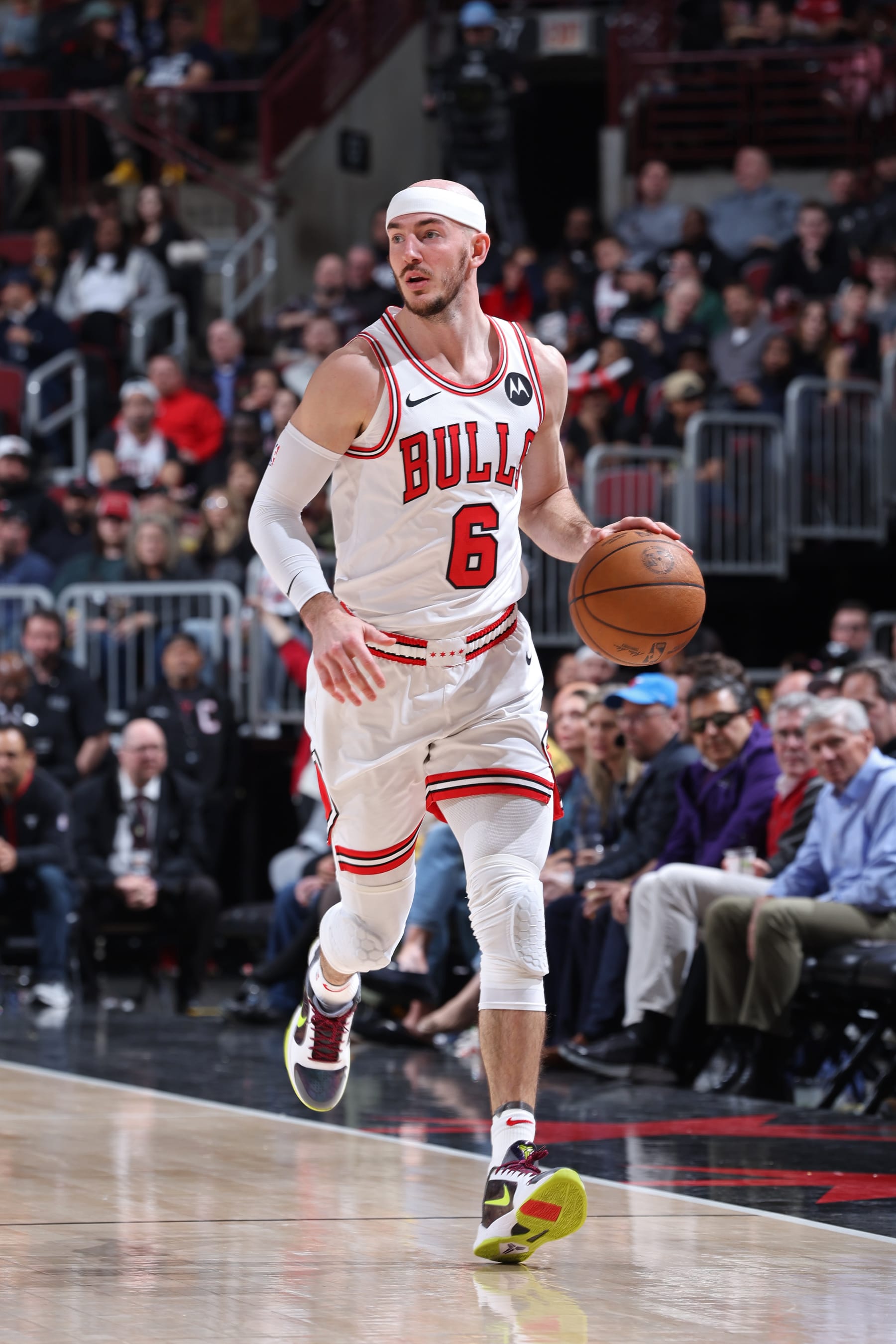 CHICAGO, IL - APRIL 9: Alex Caruso #6 of the Chicago Bulls brings the ball up court during the game against the New York Knicks on April 9, 2024 at United Center in Chicago, Illinois. NOTE TO USER: User expressly acknowledges and agrees that, by downloading and or using this photograph, User is consenting to the terms and conditions of the Getty Images License Agreement. Mandatory Copyright Notice: Copyright 2024 NBAE (Photo by Jeff Haynes/NBAE via Getty Images)