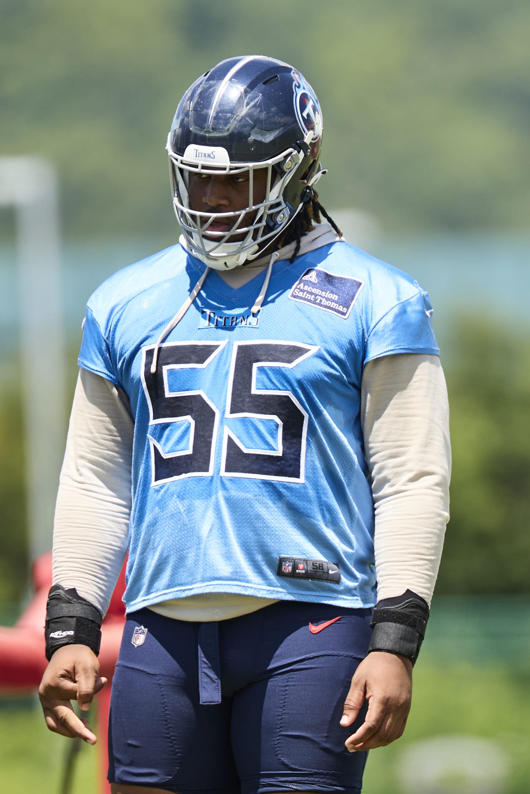 NASHVILLE, TENNESSEE - JUNE 06: JC Latham #55 of the Tennessee Titans looks on during Day 3 of  Titans Mandatory Minicamp at Ascension Saint Thomas Sports Park on June 06, 2024 in Nashville, Tennessee. (Photo by Johnnie Izquierdo/Getty Images)