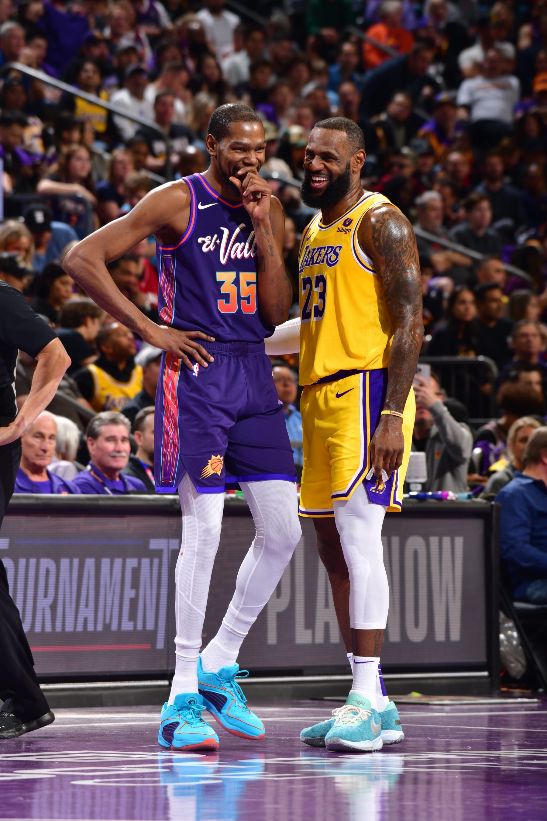PHOENIX, AZ - NOVEMBER 10: Kevin Durant #35 of the Phoenix Suns and LeBron James #23 of the Los Angeles Lakers smile during the game during the In-Season Tournament on November 10, 2023 at Footprint Center in Phoenix, Arizona. NOTE TO USER: User expressly acknowledges and agrees that, by downloading and or using this photograph, user is consenting to the terms and conditions of the Getty Images License Agreement. Mandatory Copyright Notice: Copyright 2023 NBAE (Photo by Barry Gossage/NBAE via Getty Images)