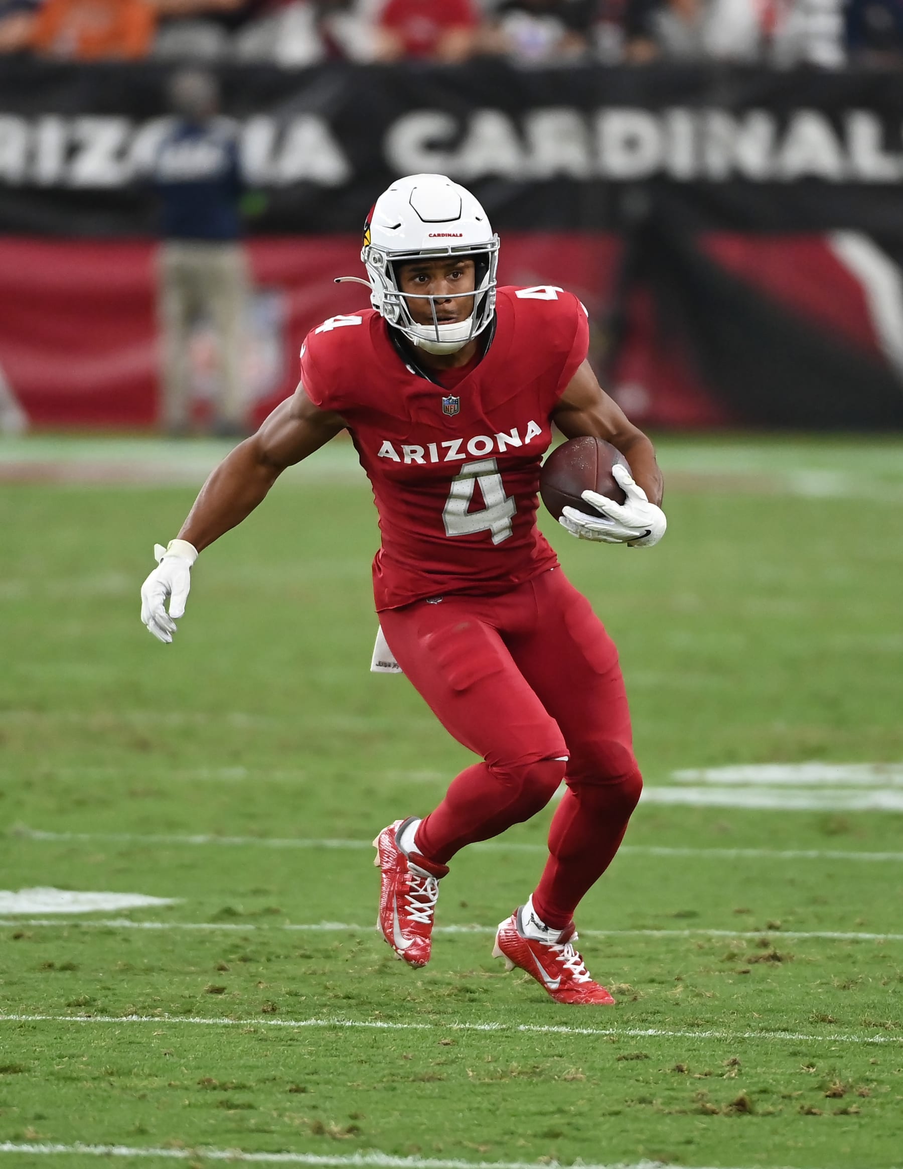 GLENDALE, ARIZONA - NOVEMBER 12: Rondale Moore #4 of the Arizona Cardinals runs with the ball against the Atlanta Falcons at State Farm Stadium on November 12, 2023 in Glendale, Arizona. (Photo by Norm Hall/Getty Images)