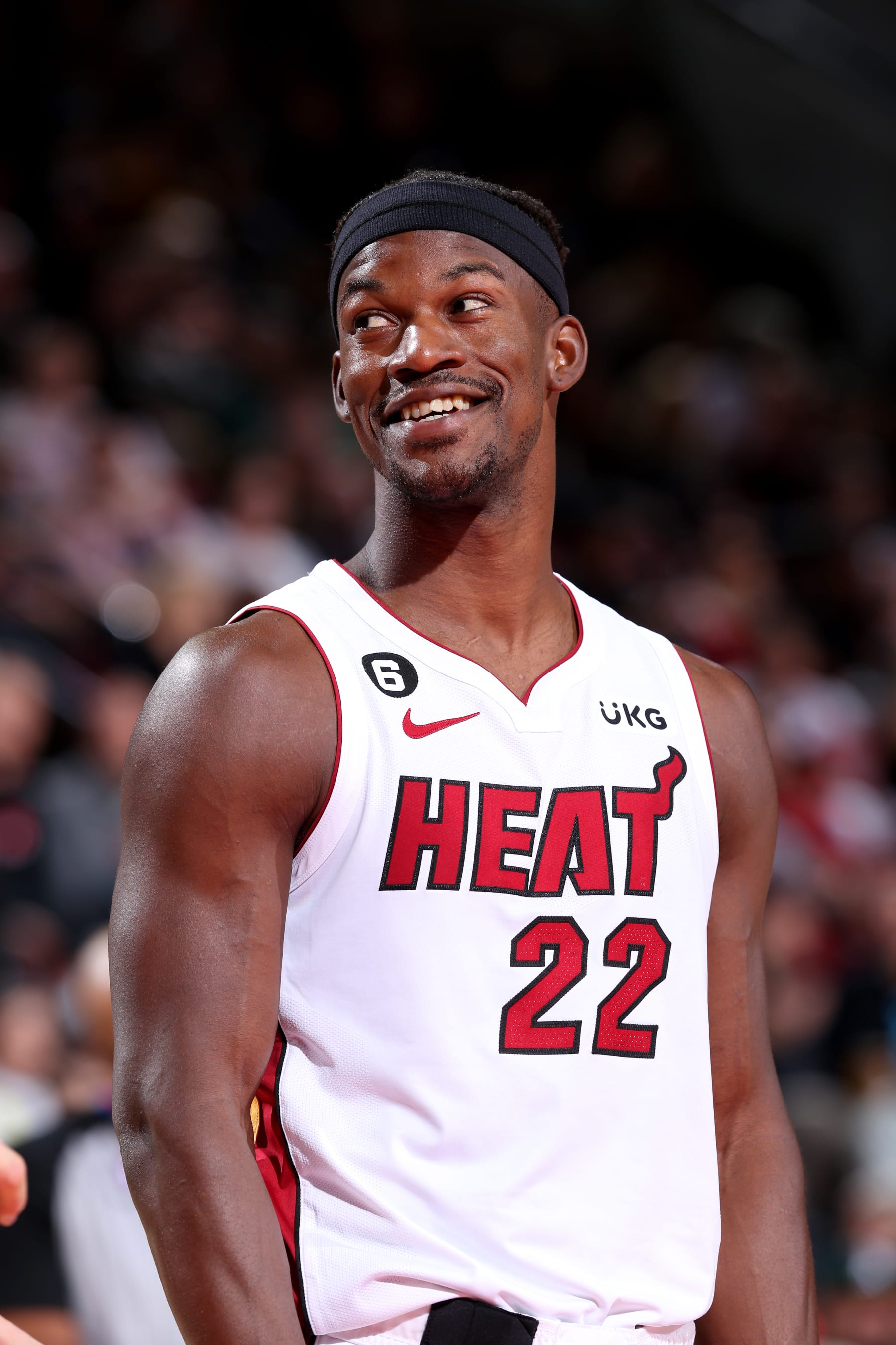PORTLAND, OR - OCTOBER 26: Jimmy Butler #22 of the Miami Heat smiles during the game against the Portland Trail Blazers on October 26, 2022 at the Moda Center Arena in Portland, Oregon. NOTE TO USER: User expressly acknowledges and agrees that, by downloading and or using this photograph, user is consenting to the terms and conditions of the Getty Images License Agreement. Mandatory Copyright Notice: Copyright 2022 NBAE (Photo by Sam Forencich/NBAE via Getty Images)