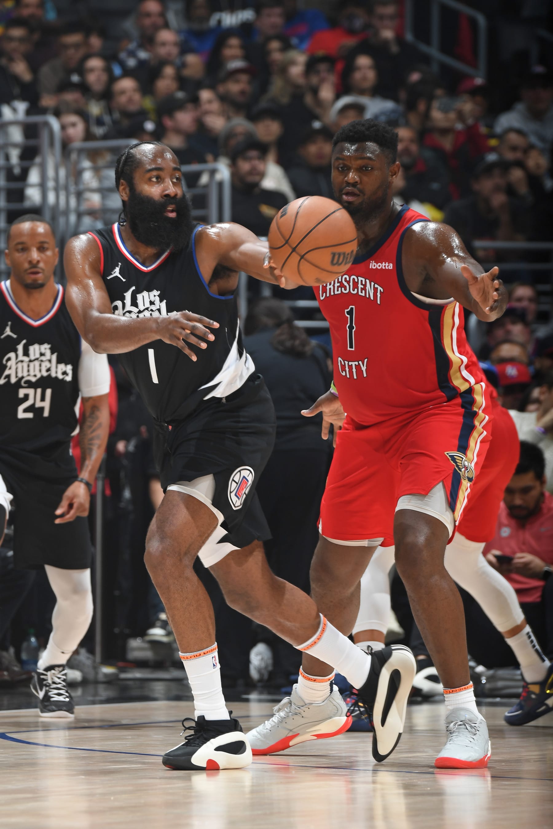 LOS ANGELES, CA - FEBRUARY 7: James Harden #1 of the LA Clippers passes the ball during the game against the New Orleans Pelicans on February 7, 2024 at Crypto.Com Arena in Los Angeles, California. NOTE TO USER: User expressly acknowledges and agrees that, by downloading and/or using this Photograph, user is consenting to the terms and conditions of the Getty Images License Agreement. Mandatory Copyright Notice: Copyright 2024 NBAE (Photo by Andrew D. Bernstein/NBAE via Getty Images)