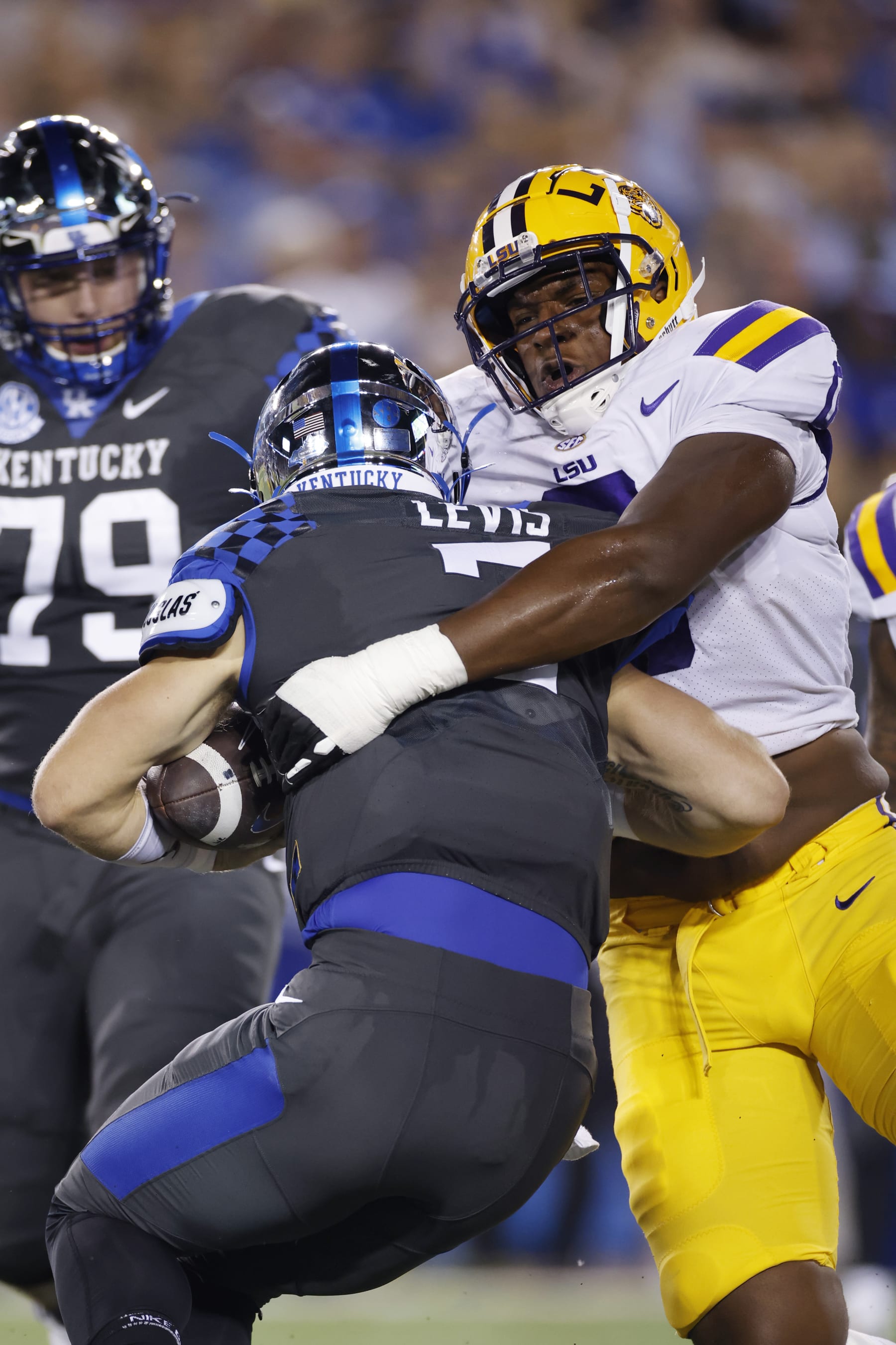 LEXINGTON, KY - OCTOBER 09: LSU Tigers defensive lineman Maason Smith (0) sacks Kentucky Wildcats quarterback Will Levis (7) during a college football game on Oct. 9, 2021 at Kroger Field in Lexington, Kentucky. (Photo by Joe Robbins/Icon Sportswire via Getty Images)